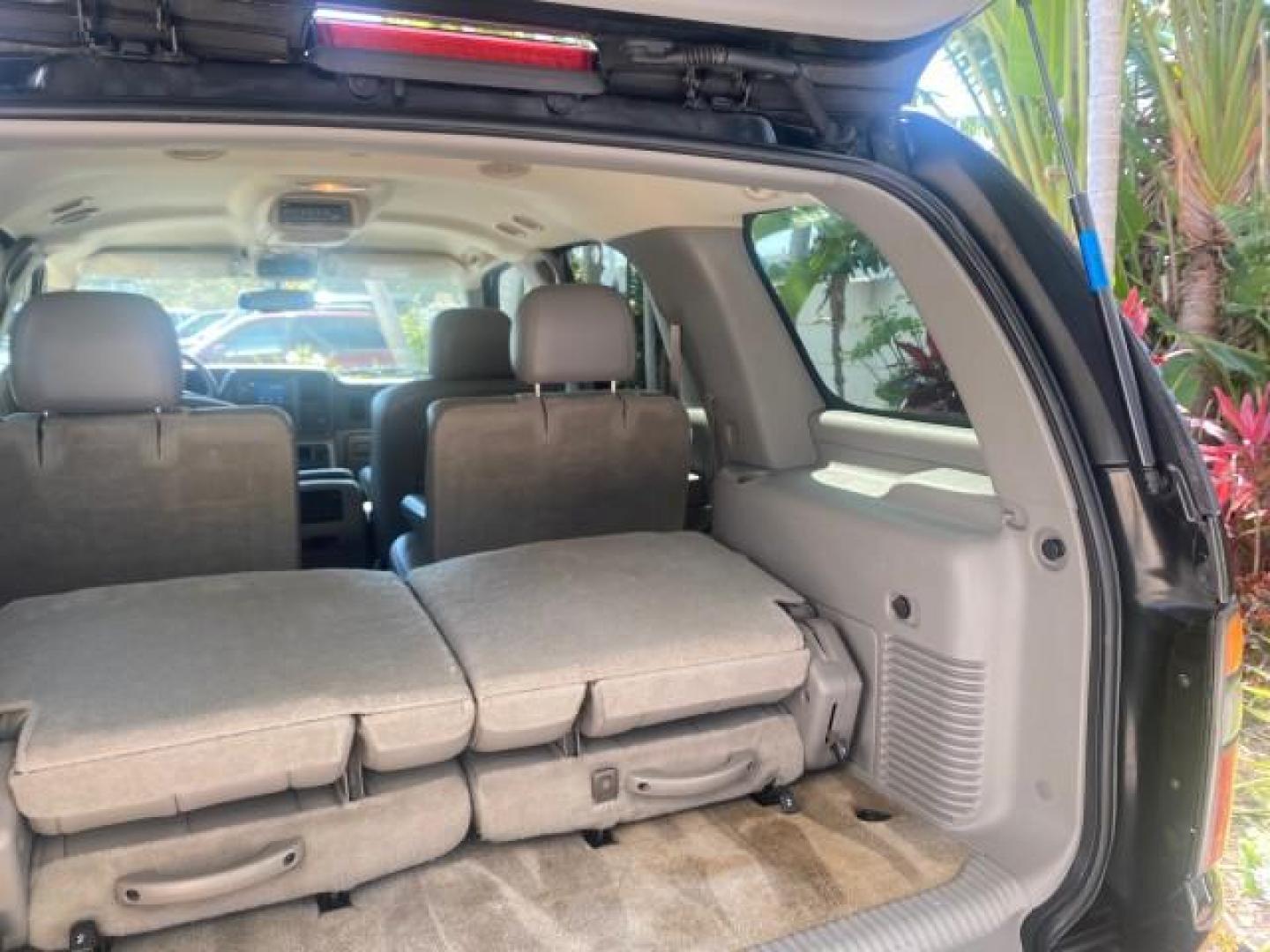 2005 Black /Gray/Dark Charcoal Chevrolet Tahoe LS Z71 1 OWNER LOW MILES 82,796 (1GNEC13T85R) with an 5.3L Vortec 5300 V8 SFI Engine engine, Automatic transmission, located at 4701 North Dixie Hwy, Pompano Beach, FL, 33064, (954) 422-2889, 26.240938, -80.123474 - OUR WEBPAGE FLORIDACARS1.COM HAS OVER 100 PHOTOS AND FREE CARFAX LINK 2005 CHEVROLET TAHOE LS 1 OWNER NO ACCIDENTS16 SERVICE RECORDS VIN: 1GNEC13T85R212888 1 G N E C 1 3 T 8 5 R 2 1 2 8 8 8 4 DOOR WAGON/SPORT UTILITY 5.3L V8 F GASOLINE REAR WHEEL DRIVE Top Features Alloy Wheels Rear Air Conditioning - Photo#88
