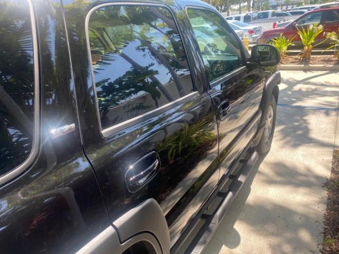2005 Black /Gray/Dark Charcoal Chevrolet Tahoe LS Z71 1 OWNER LOW MILES 82,796 (1GNEC13T85R) with an 5.3L Vortec 5300 V8 SFI Engine engine, Automatic transmission, located at 4701 North Dixie Hwy, Pompano Beach, FL, 33064, (954) 422-2889, 26.240938, -80.123474 - OUR WEBPAGE FLORIDACARS1.COM HAS OVER 100 PHOTOS AND FREE CARFAX LINK 2005 CHEVROLET TAHOE LS 1 OWNER NO ACCIDENTS16 SERVICE RECORDS VIN: 1GNEC13T85R212888 1 G N E C 1 3 T 8 5 R 2 1 2 8 8 8 4 DOOR WAGON/SPORT UTILITY 5.3L V8 F GASOLINE REAR WHEEL DRIVE Top Features Alloy Wheels Rear Air Conditioning - Photo#91
