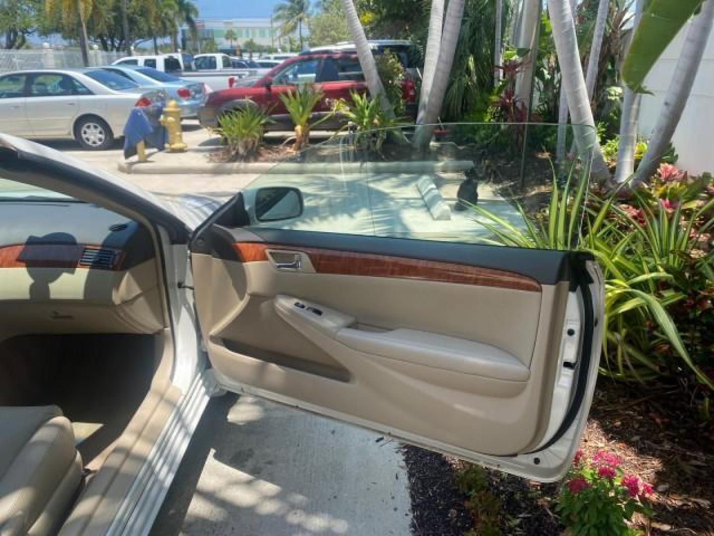 2008 Blizzard White Pearl /Ivory Toyota Camry Solara SLE 1 owner fl low miles 61,220 (4T1FA38P78U) with an 3.3L DOHC SMPI VVT-i 24-Valve V6 Engine engine, Automatic transmission, located at 4701 North Dixie Hwy, Pompano Beach, FL, 33064, (954) 422-2889, 26.240938, -80.123474 - OUR WEBPAGE FLORIDACARS1.COM HAS OVER 100 PHOTOS AND FREE CARFAX LINK 2008 TOYOTA CAMRY SOLARA SLE V6 PEARL WHITE IMMACULATE VIN: 4T1FA38P78U161195 4 T 1 F A 3 8 P 7 8 U 1 6 1 1 9 5 CONVERTIBLE 3.3L V6 F DOHC 24V 29 MPG GASOLINE FRONT WHEEL DRIVE Top Features Alloy Wheels Leather Seats Bluetooth Tec - Photo#11