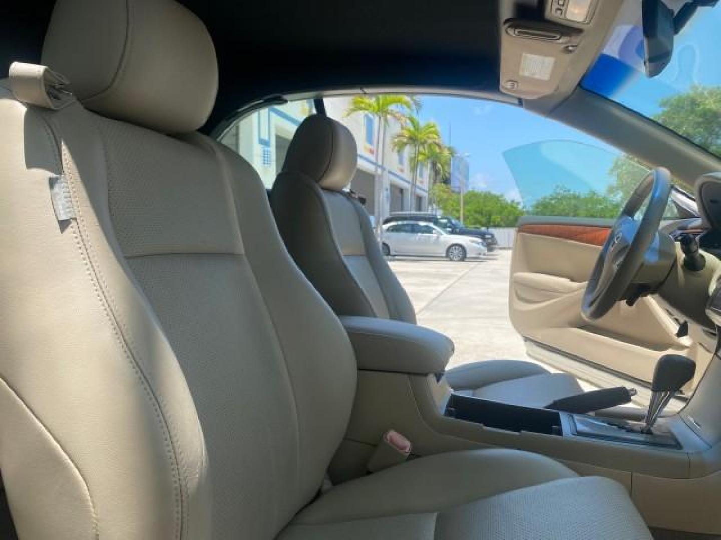 2008 Blizzard White Pearl /Ivory Toyota Camry Solara SLE 1 owner fl low miles 61,220 (4T1FA38P78U) with an 3.3L DOHC SMPI VVT-i 24-Valve V6 Engine engine, Automatic transmission, located at 4701 North Dixie Hwy, Pompano Beach, FL, 33064, (954) 422-2889, 26.240938, -80.123474 - OUR WEBPAGE FLORIDACARS1.COM HAS OVER 100 PHOTOS AND FREE CARFAX LINK 2008 TOYOTA CAMRY SOLARA SLE V6 PEARL WHITE IMMACULATE VIN: 4T1FA38P78U161195 4 T 1 F A 3 8 P 7 8 U 1 6 1 1 9 5 CONVERTIBLE 3.3L V6 F DOHC 24V 29 MPG GASOLINE FRONT WHEEL DRIVE Top Features Alloy Wheels Leather Seats Bluetooth Tec - Photo#12