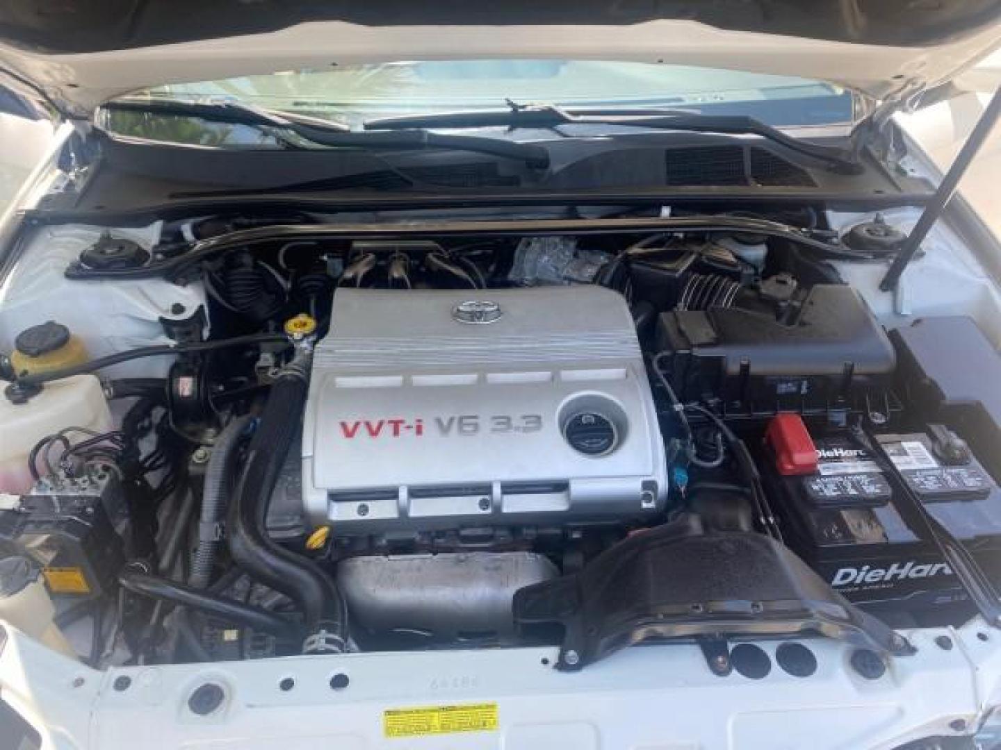 2008 Blizzard White Pearl /Ivory Toyota Camry Solara SLE 1 owner fl low miles 61,220 (4T1FA38P78U) with an 3.3L DOHC SMPI VVT-i 24-Valve V6 Engine engine, Automatic transmission, located at 4701 North Dixie Hwy, Pompano Beach, FL, 33064, (954) 422-2889, 26.240938, -80.123474 - OUR WEBPAGE FLORIDACARS1.COM HAS OVER 100 PHOTOS AND FREE CARFAX LINK 2008 TOYOTA CAMRY SOLARA SLE V6 PEARL WHITE IMMACULATE VIN: 4T1FA38P78U161195 4 T 1 F A 3 8 P 7 8 U 1 6 1 1 9 5 CONVERTIBLE 3.3L V6 F DOHC 24V 29 MPG GASOLINE FRONT WHEEL DRIVE Top Features Alloy Wheels Leather Seats Bluetooth Tec - Photo#17