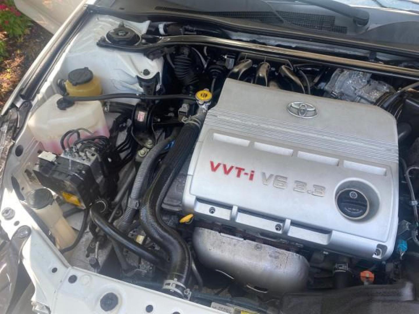 2008 Blizzard White Pearl /Ivory Toyota Camry Solara SLE 1 owner fl low miles 61,220 (4T1FA38P78U) with an 3.3L DOHC SMPI VVT-i 24-Valve V6 Engine engine, Automatic transmission, located at 4701 North Dixie Hwy, Pompano Beach, FL, 33064, (954) 422-2889, 26.240938, -80.123474 - OUR WEBPAGE FLORIDACARS1.COM HAS OVER 100 PHOTOS AND FREE CARFAX LINK 2008 TOYOTA CAMRY SOLARA SLE V6 PEARL WHITE IMMACULATE VIN: 4T1FA38P78U161195 4 T 1 F A 3 8 P 7 8 U 1 6 1 1 9 5 CONVERTIBLE 3.3L V6 F DOHC 24V 29 MPG GASOLINE FRONT WHEEL DRIVE Top Features Alloy Wheels Leather Seats Bluetooth Tec - Photo#24