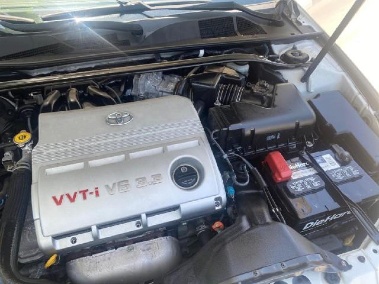 2008 Blizzard White Pearl /Ivory Toyota Camry Solara SLE 1 owner fl low miles 61,220 (4T1FA38P78U) with an 3.3L DOHC SMPI VVT-i 24-Valve V6 Engine engine, Automatic transmission, located at 4701 North Dixie Hwy, Pompano Beach, FL, 33064, (954) 422-2889, 26.240938, -80.123474 - OUR WEBPAGE FLORIDACARS1.COM HAS OVER 100 PHOTOS AND FREE CARFAX LINK 2008 TOYOTA CAMRY SOLARA SLE V6 PEARL WHITE IMMACULATE VIN: 4T1FA38P78U161195 4 T 1 F A 3 8 P 7 8 U 1 6 1 1 9 5 CONVERTIBLE 3.3L V6 F DOHC 24V 29 MPG GASOLINE FRONT WHEEL DRIVE Top Features Alloy Wheels Leather Seats Bluetooth Tec - Photo#25
