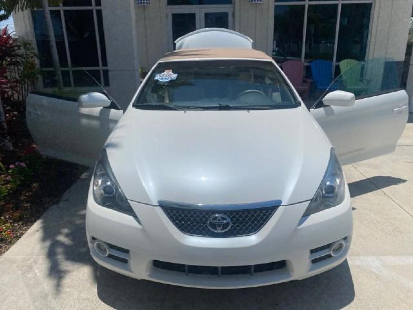2008 Blizzard White Pearl /Ivory Toyota Camry Solara SLE 1 owner fl low miles 61,220 (4T1FA38P78U) with an 3.3L DOHC SMPI VVT-i 24-Valve V6 Engine engine, Automatic transmission, located at 4701 North Dixie Hwy, Pompano Beach, FL, 33064, (954) 422-2889, 26.240938, -80.123474 - OUR WEBPAGE FLORIDACARS1.COM HAS OVER 100 PHOTOS AND FREE CARFAX LINK 2008 TOYOTA CAMRY SOLARA SLE V6 PEARL WHITE IMMACULATE VIN: 4T1FA38P78U161195 4 T 1 F A 3 8 P 7 8 U 1 6 1 1 9 5 CONVERTIBLE 3.3L V6 F DOHC 24V 29 MPG GASOLINE FRONT WHEEL DRIVE Top Features Alloy Wheels Leather Seats Bluetooth Tec - Photo#28