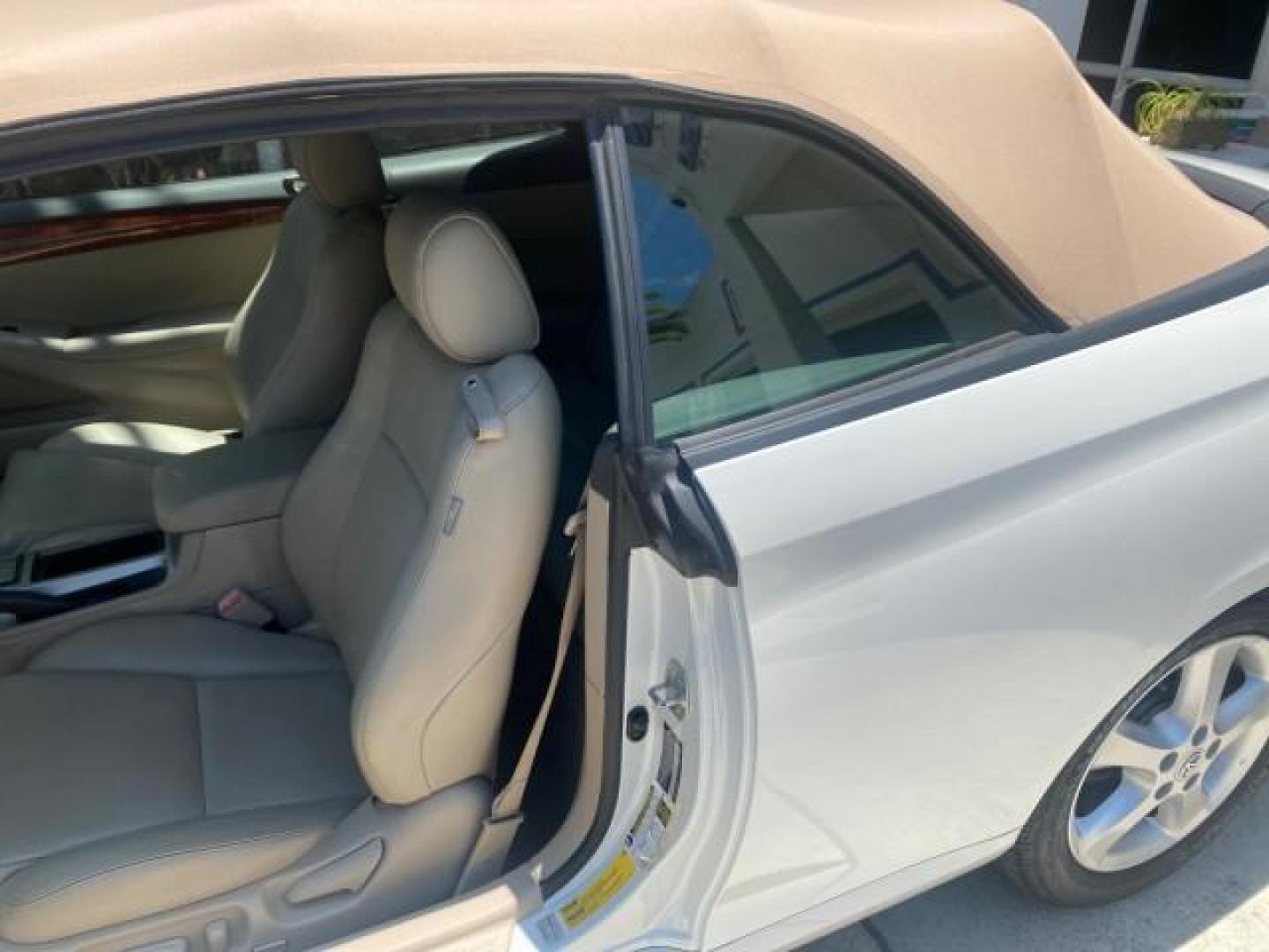 2008 Blizzard White Pearl /Ivory Toyota Camry Solara SLE 1 owner fl low miles 61,220 (4T1FA38P78U) with an 3.3L DOHC SMPI VVT-i 24-Valve V6 Engine engine, Automatic transmission, located at 4701 North Dixie Hwy, Pompano Beach, FL, 33064, (954) 422-2889, 26.240938, -80.123474 - OUR WEBPAGE FLORIDACARS1.COM HAS OVER 100 PHOTOS AND FREE CARFAX LINK 2008 TOYOTA CAMRY SOLARA SLE V6 PEARL WHITE IMMACULATE VIN: 4T1FA38P78U161195 4 T 1 F A 3 8 P 7 8 U 1 6 1 1 9 5 CONVERTIBLE 3.3L V6 F DOHC 24V 29 MPG GASOLINE FRONT WHEEL DRIVE Top Features Alloy Wheels Leather Seats Bluetooth Tec - Photo#58