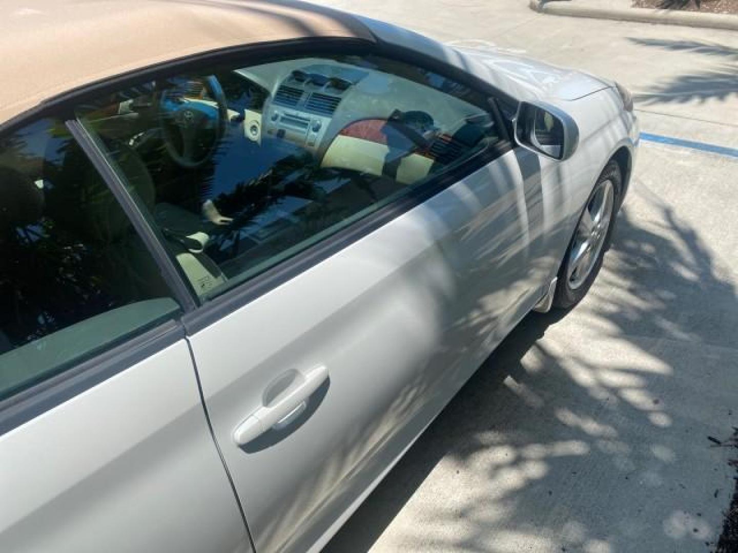 2008 Blizzard White Pearl /Ivory Toyota Camry Solara SLE 1 owner fl low miles 61,220 (4T1FA38P78U) with an 3.3L DOHC SMPI VVT-i 24-Valve V6 Engine engine, Automatic transmission, located at 4701 North Dixie Hwy, Pompano Beach, FL, 33064, (954) 422-2889, 26.240938, -80.123474 - OUR WEBPAGE FLORIDACARS1.COM HAS OVER 100 PHOTOS AND FREE CARFAX LINK 2008 TOYOTA CAMRY SOLARA SLE V6 PEARL WHITE IMMACULATE VIN: 4T1FA38P78U161195 4 T 1 F A 3 8 P 7 8 U 1 6 1 1 9 5 CONVERTIBLE 3.3L V6 F DOHC 24V 29 MPG GASOLINE FRONT WHEEL DRIVE Top Features Alloy Wheels Leather Seats Bluetooth Tec - Photo#78