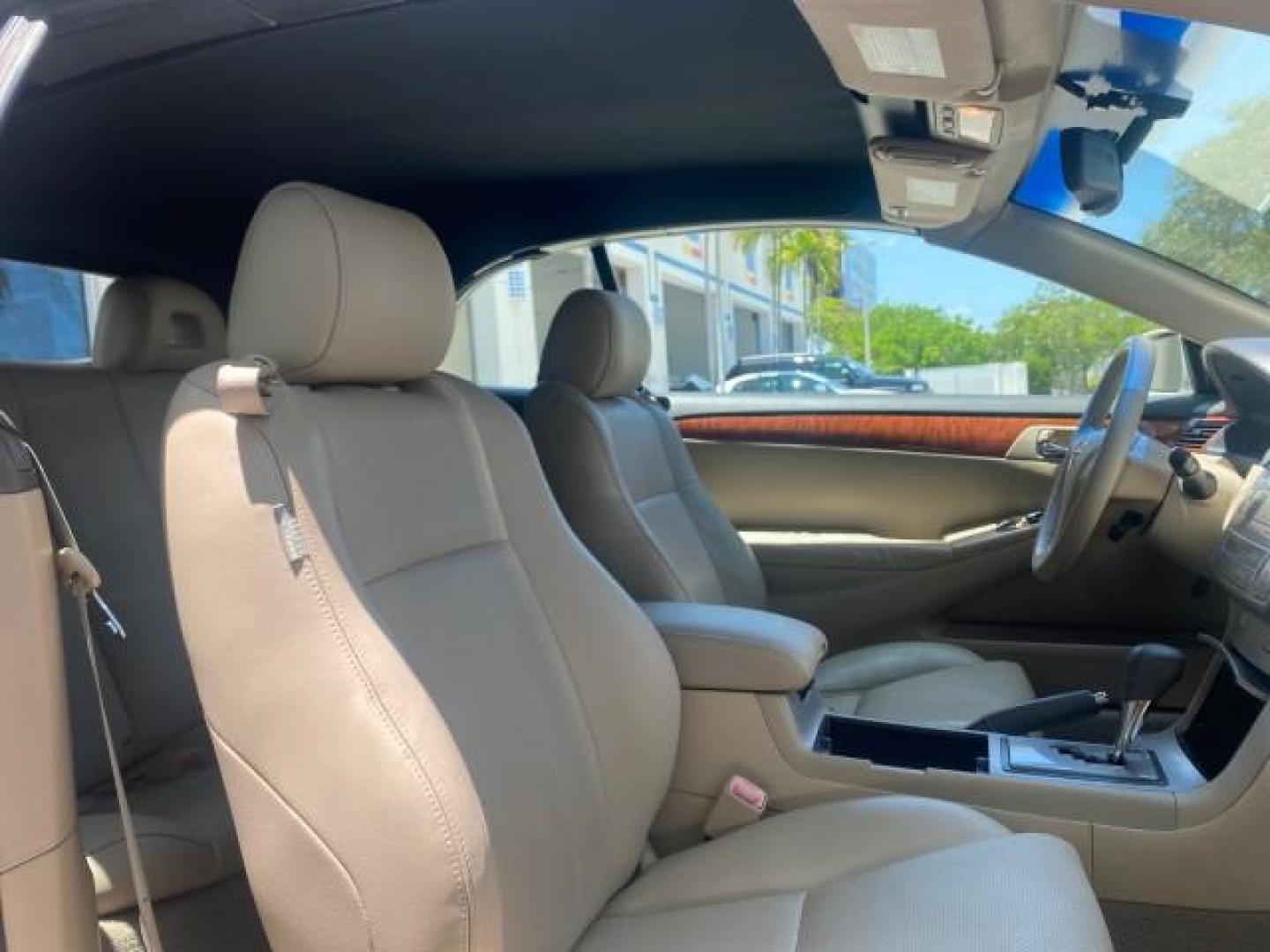 2008 Blizzard White Pearl /Ivory Toyota Camry Solara SLE 1 owner fl low miles 61,220 (4T1FA38P78U) with an 3.3L DOHC SMPI VVT-i 24-Valve V6 Engine engine, Automatic transmission, located at 4701 North Dixie Hwy, Pompano Beach, FL, 33064, (954) 422-2889, 26.240938, -80.123474 - OUR WEBPAGE FLORIDACARS1.COM HAS OVER 100 PHOTOS AND FREE CARFAX LINK 2008 TOYOTA CAMRY SOLARA SLE V6 PEARL WHITE IMMACULATE VIN: 4T1FA38P78U161195 4 T 1 F A 3 8 P 7 8 U 1 6 1 1 9 5 CONVERTIBLE 3.3L V6 F DOHC 24V 29 MPG GASOLINE FRONT WHEEL DRIVE Top Features Alloy Wheels Leather Seats Bluetooth Tec - Photo#81
