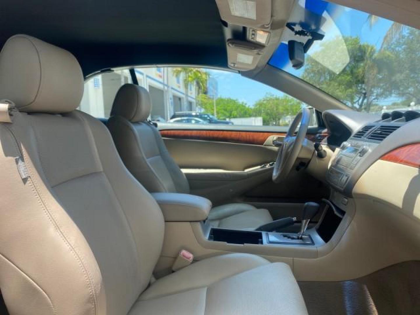 2008 Blizzard White Pearl /Ivory Toyota Camry Solara SLE 1 owner fl low miles 61,220 (4T1FA38P78U) with an 3.3L DOHC SMPI VVT-i 24-Valve V6 Engine engine, Automatic transmission, located at 4701 North Dixie Hwy, Pompano Beach, FL, 33064, (954) 422-2889, 26.240938, -80.123474 - OUR WEBPAGE FLORIDACARS1.COM HAS OVER 100 PHOTOS AND FREE CARFAX LINK 2008 TOYOTA CAMRY SOLARA SLE V6 PEARL WHITE IMMACULATE VIN: 4T1FA38P78U161195 4 T 1 F A 3 8 P 7 8 U 1 6 1 1 9 5 CONVERTIBLE 3.3L V6 F DOHC 24V 29 MPG GASOLINE FRONT WHEEL DRIVE Top Features Alloy Wheels Leather Seats Bluetooth Tec - Photo#82
