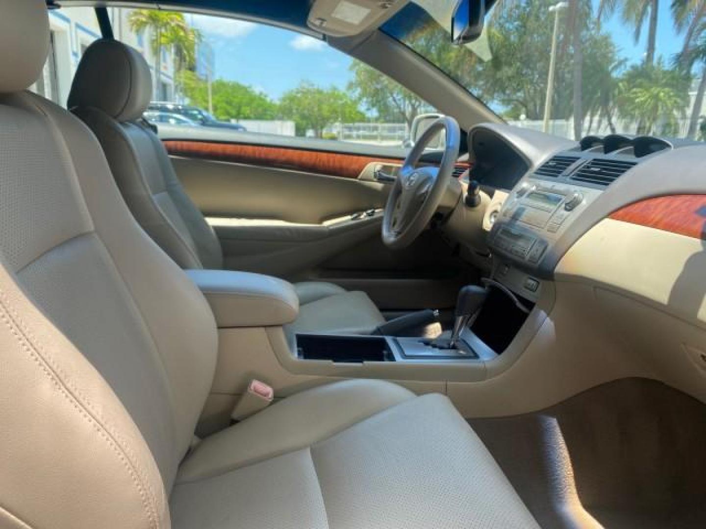 2008 Blizzard White Pearl /Ivory Toyota Camry Solara SLE 1 owner fl low miles 61,220 (4T1FA38P78U) with an 3.3L DOHC SMPI VVT-i 24-Valve V6 Engine engine, Automatic transmission, located at 4701 North Dixie Hwy, Pompano Beach, FL, 33064, (954) 422-2889, 26.240938, -80.123474 - OUR WEBPAGE FLORIDACARS1.COM HAS OVER 100 PHOTOS AND FREE CARFAX LINK 2008 TOYOTA CAMRY SOLARA SLE V6 PEARL WHITE IMMACULATE VIN: 4T1FA38P78U161195 4 T 1 F A 3 8 P 7 8 U 1 6 1 1 9 5 CONVERTIBLE 3.3L V6 F DOHC 24V 29 MPG GASOLINE FRONT WHEEL DRIVE Top Features Alloy Wheels Leather Seats Bluetooth Tec - Photo#83