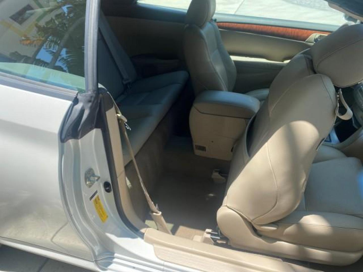 2008 Blizzard White Pearl /Ivory Toyota Camry Solara SLE 1 owner fl low miles 61,220 (4T1FA38P78U) with an 3.3L DOHC SMPI VVT-i 24-Valve V6 Engine engine, Automatic transmission, located at 4701 North Dixie Hwy, Pompano Beach, FL, 33064, (954) 422-2889, 26.240938, -80.123474 - OUR WEBPAGE FLORIDACARS1.COM HAS OVER 100 PHOTOS AND FREE CARFAX LINK 2008 TOYOTA CAMRY SOLARA SLE V6 PEARL WHITE IMMACULATE VIN: 4T1FA38P78U161195 4 T 1 F A 3 8 P 7 8 U 1 6 1 1 9 5 CONVERTIBLE 3.3L V6 F DOHC 24V 29 MPG GASOLINE FRONT WHEEL DRIVE Top Features Alloy Wheels Leather Seats Bluetooth Tec - Photo#85