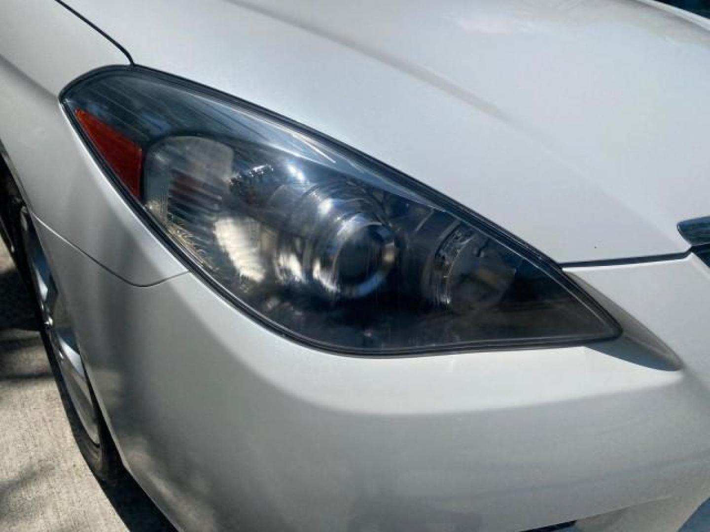 2008 Blizzard White Pearl /Ivory Toyota Camry Solara SLE 1 owner fl low miles 61,220 (4T1FA38P78U) with an 3.3L DOHC SMPI VVT-i 24-Valve V6 Engine engine, Automatic transmission, located at 4701 North Dixie Hwy, Pompano Beach, FL, 33064, (954) 422-2889, 26.240938, -80.123474 - OUR WEBPAGE FLORIDACARS1.COM HAS OVER 100 PHOTOS AND FREE CARFAX LINK 2008 TOYOTA CAMRY SOLARA SLE V6 PEARL WHITE IMMACULATE VIN: 4T1FA38P78U161195 4 T 1 F A 3 8 P 7 8 U 1 6 1 1 9 5 CONVERTIBLE 3.3L V6 F DOHC 24V 29 MPG GASOLINE FRONT WHEEL DRIVE Top Features Alloy Wheels Leather Seats Bluetooth Tec - Photo#94