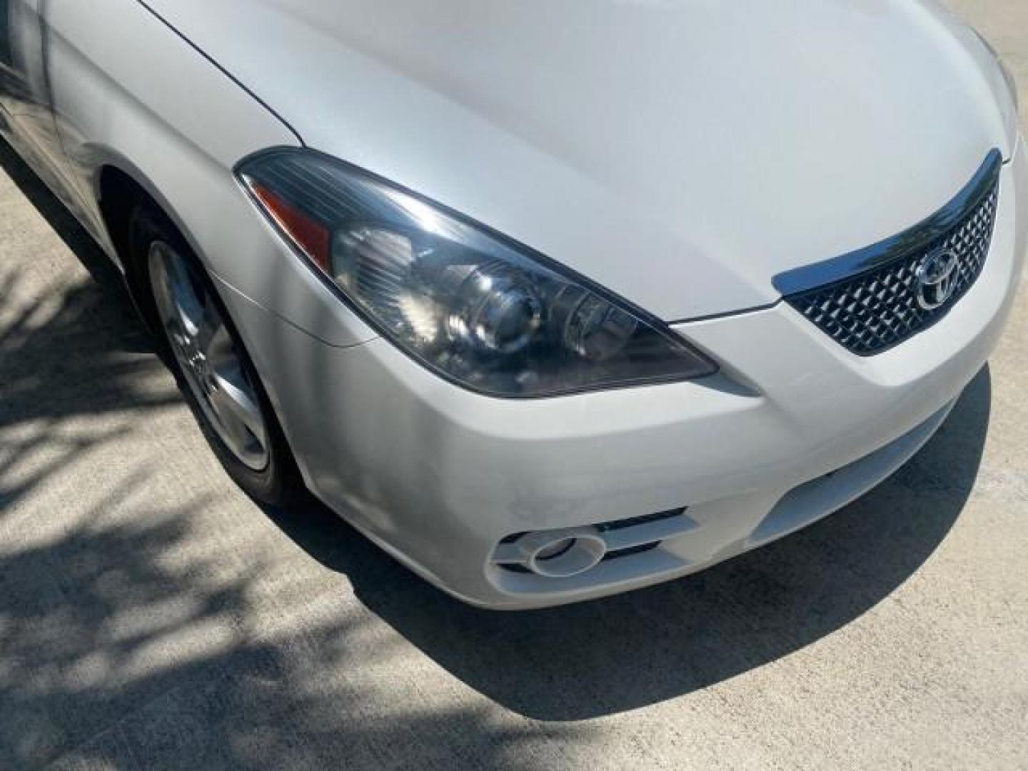 2008 Blizzard White Pearl /Ivory Toyota Camry Solara SLE 1 owner fl low miles 61,220 (4T1FA38P78U) with an 3.3L DOHC SMPI VVT-i 24-Valve V6 Engine engine, Automatic transmission, located at 4701 North Dixie Hwy, Pompano Beach, FL, 33064, (954) 422-2889, 26.240938, -80.123474 - OUR WEBPAGE FLORIDACARS1.COM HAS OVER 100 PHOTOS AND FREE CARFAX LINK 2008 TOYOTA CAMRY SOLARA SLE V6 PEARL WHITE IMMACULATE VIN: 4T1FA38P78U161195 4 T 1 F A 3 8 P 7 8 U 1 6 1 1 9 5 CONVERTIBLE 3.3L V6 F DOHC 24V 29 MPG GASOLINE FRONT WHEEL DRIVE Top Features Alloy Wheels Leather Seats Bluetooth Tec - Photo#96