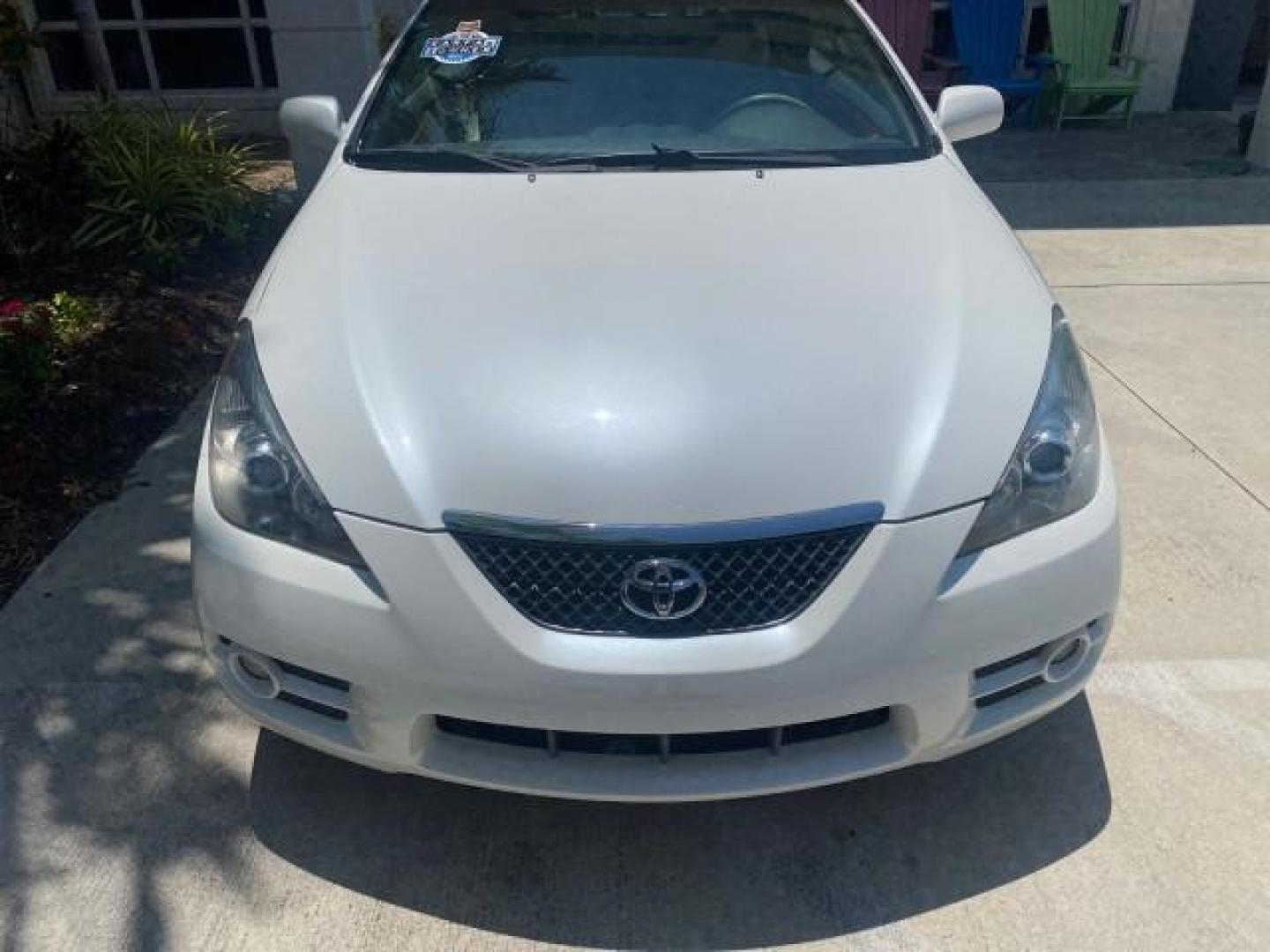 2008 Blizzard White Pearl /Ivory Toyota Camry Solara SLE 1 owner fl low miles 61,220 (4T1FA38P78U) with an 3.3L DOHC SMPI VVT-i 24-Valve V6 Engine engine, Automatic transmission, located at 4701 North Dixie Hwy, Pompano Beach, FL, 33064, (954) 422-2889, 26.240938, -80.123474 - OUR WEBPAGE FLORIDACARS1.COM HAS OVER 100 PHOTOS AND FREE CARFAX LINK 2008 TOYOTA CAMRY SOLARA SLE V6 PEARL WHITE IMMACULATE VIN: 4T1FA38P78U161195 4 T 1 F A 3 8 P 7 8 U 1 6 1 1 9 5 CONVERTIBLE 3.3L V6 F DOHC 24V 29 MPG GASOLINE FRONT WHEEL DRIVE Top Features Alloy Wheels Leather Seats Bluetooth Tec - Photo#97