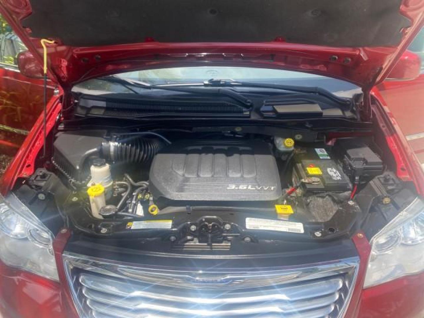 2012 Deep Cherry Red Crystal Pearl /Dark Frost Beige/Medium Frost Be Chrysler Town and Country 1 OWNER LOW MILES 58.406 (2C4RC1BG4CR) with an 3.6L V6 Cylinder Engine engine, Automatic transmission, located at 4701 North Dixie Hwy, Pompano Beach, FL, 33064, (954) 422-2889, 26.240938, -80.123474 - OUR WEBPAGE FLORIDACARS1.COM HAS OVER 100 PHOTOS AND FREE CARFAX LINK 2012 CHRYSLER TOWN AND COUNTRY TOURING VIN: 2C4RC1BG4CR189972 2 C 4 R C 1 B G 4 C R 1 8 9 9 7 2 VAN 3.6L V6 F DOHC 24V GASOLINE FRONT WHEEL DRIVE Top Features Alloy Wheels Rear Air Conditioning Bluetooth Technology Rear Entertainm - Photo#17