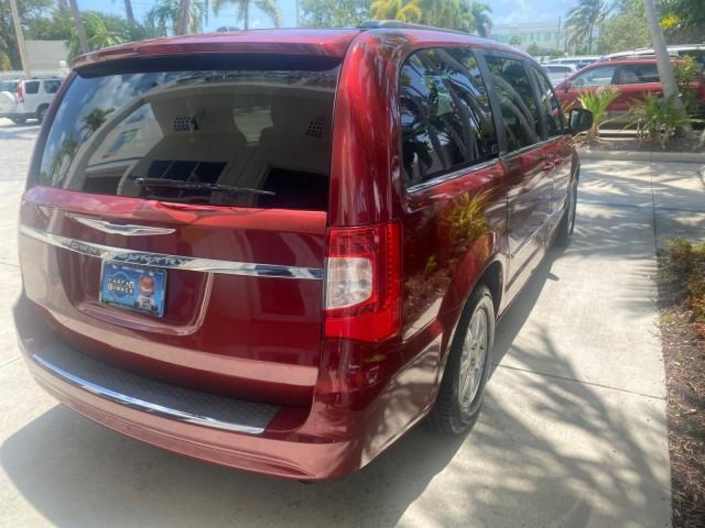 2012 Deep Cherry Red Crystal Pearl /Dark Frost Beige/Medium Frost Be Chrysler Town and Country 1 OWNER LOW MILES 58.406 (2C4RC1BG4CR) with an 3.6L V6 Cylinder Engine engine, Automatic transmission, located at 4701 North Dixie Hwy, Pompano Beach, FL, 33064, (954) 422-2889, 26.240938, -80.123474 - OUR WEBPAGE FLORIDACARS1.COM HAS OVER 100 PHOTOS AND FREE CARFAX LINK 2012 CHRYSLER TOWN AND COUNTRY TOURING VIN: 2C4RC1BG4CR189972 2 C 4 R C 1 B G 4 C R 1 8 9 9 7 2 VAN 3.6L V6 F DOHC 24V GASOLINE FRONT WHEEL DRIVE Top Features Alloy Wheels Rear Air Conditioning Bluetooth Technology Rear Entertainm - Photo#80