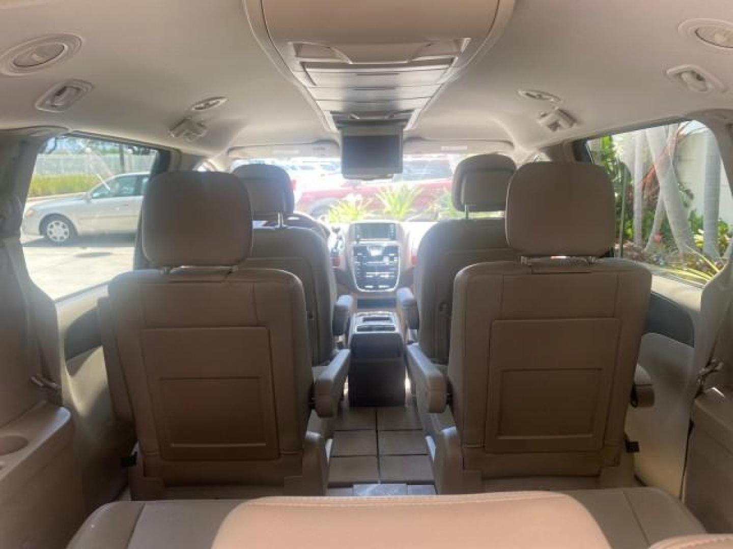 2012 Deep Cherry Red Crystal Pearl /Dark Frost Beige/Medium Frost Be Chrysler Town and Country 1 OWNER LOW MILES 58.406 (2C4RC1BG4CR) with an 3.6L V6 Cylinder Engine engine, Automatic transmission, located at 4701 North Dixie Hwy, Pompano Beach, FL, 33064, (954) 422-2889, 26.240938, -80.123474 - OUR WEBPAGE FLORIDACARS1.COM HAS OVER 100 PHOTOS AND FREE CARFAX LINK 2012 CHRYSLER TOWN AND COUNTRY TOURING VIN: 2C4RC1BG4CR189972 2 C 4 R C 1 B G 4 C R 1 8 9 9 7 2 VAN 3.6L V6 F DOHC 24V GASOLINE FRONT WHEEL DRIVE Top Features Alloy Wheels Rear Air Conditioning Bluetooth Technology Rear Entertainm - Photo#85