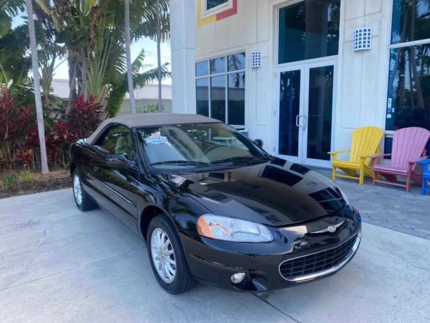 2002 Black /Sandstone Chrysler Sebring LXI 1 OWNER FL LOW MILES 22,632 (1C3EL55R32N) with an 2.7L MFI DOHC 24-Valve V6 Engine engine, Automatic transmission, located at 4701 North Dixie Hwy, Pompano Beach, FL, 33064, (954) 422-2889, 26.240938, -80.123474 - OUR WEBPAGE FLORIDACARS1.COM HAS OVER 100 PHOTOS AND FREE CARFAX LINK 2002 CHRYSLER SEBRING LXI VIN: 1C3EL55R32N294537 1 C 3 E L 5 5 R 3 2 N 2 9 4 5 3 7 CONVERTIBLE 2.7L V6 F DOHC GASOLINE FRONT WHEEL DRIVE Top Features Alloy Wheels Soft Top Cloth Seats Sunroof(s) Basic Features AM/FM Stereo CD Audi - Photo#1