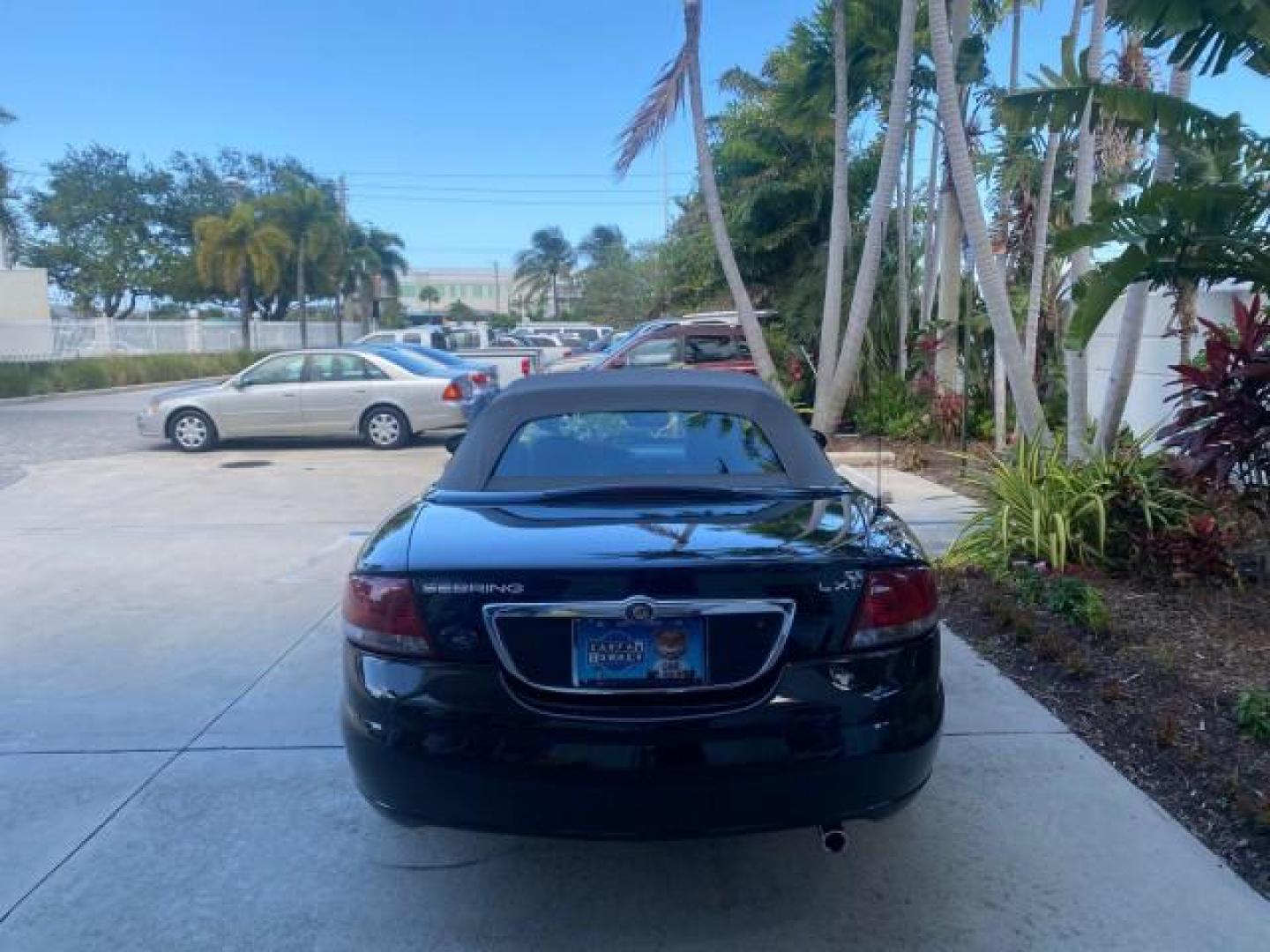 2002 Black /Sandstone Chrysler Sebring LXI 1 OWNER FL LOW MILES 22,632 (1C3EL55R32N) with an 2.7L MFI DOHC 24-Valve V6 Engine engine, Automatic transmission, located at 4701 North Dixie Hwy, Pompano Beach, FL, 33064, (954) 422-2889, 26.240938, -80.123474 - OUR WEBPAGE FLORIDACARS1.COM HAS OVER 100 PHOTOS AND FREE CARFAX LINK 2002 CHRYSLER SEBRING LXI VIN: 1C3EL55R32N294537 1 C 3 E L 5 5 R 3 2 N 2 9 4 5 3 7 CONVERTIBLE 2.7L V6 F DOHC GASOLINE FRONT WHEEL DRIVE Top Features Alloy Wheels Soft Top Cloth Seats Sunroof(s) Basic Features AM/FM Stereo CD Audi - Photo#6