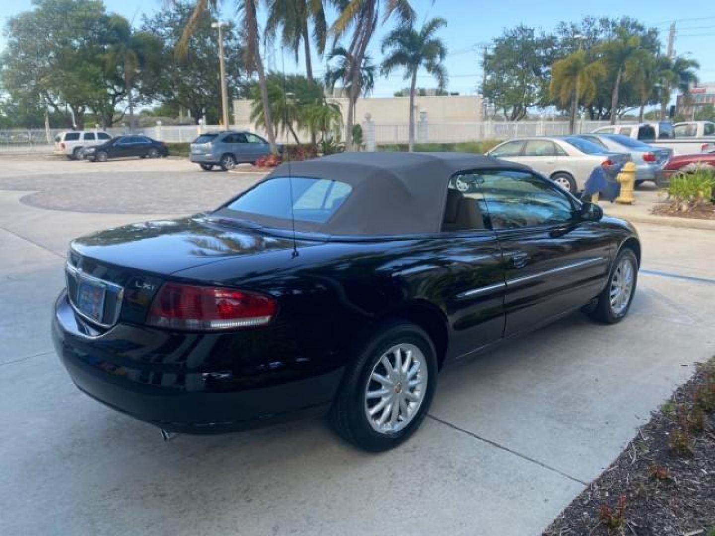 2002 Black /Sandstone Chrysler Sebring LXI 1 OWNER FL LOW MILES 22,632 (1C3EL55R32N) with an 2.7L MFI DOHC 24-Valve V6 Engine engine, Automatic transmission, located at 4701 North Dixie Hwy, Pompano Beach, FL, 33064, (954) 422-2889, 26.240938, -80.123474 - OUR WEBPAGE FLORIDACARS1.COM HAS OVER 100 PHOTOS AND FREE CARFAX LINK 2002 CHRYSLER SEBRING LXI VIN: 1C3EL55R32N294537 1 C 3 E L 5 5 R 3 2 N 2 9 4 5 3 7 CONVERTIBLE 2.7L V6 F DOHC GASOLINE FRONT WHEEL DRIVE Top Features Alloy Wheels Soft Top Cloth Seats Sunroof(s) Basic Features AM/FM Stereo CD Audi - Photo#7