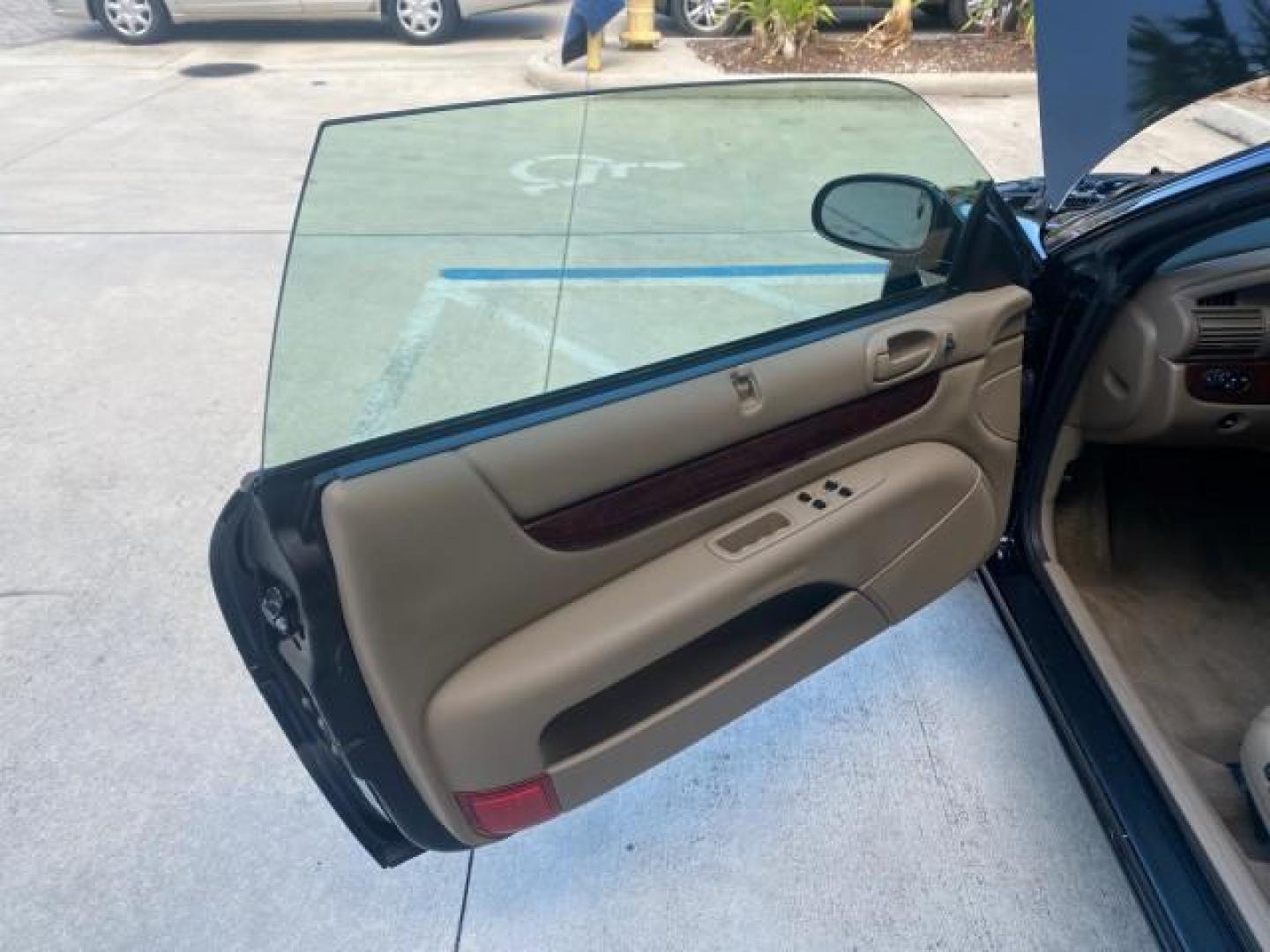 2002 Black /Sandstone Chrysler Sebring LXI 1 OWNER FL LOW MILES 22,632 (1C3EL55R32N) with an 2.7L MFI DOHC 24-Valve V6 Engine engine, Automatic transmission, located at 4701 North Dixie Hwy, Pompano Beach, FL, 33064, (954) 422-2889, 26.240938, -80.123474 - OUR WEBPAGE FLORIDACARS1.COM HAS OVER 100 PHOTOS AND FREE CARFAX LINK 2002 CHRYSLER SEBRING LXI VIN: 1C3EL55R32N294537 1 C 3 E L 5 5 R 3 2 N 2 9 4 5 3 7 CONVERTIBLE 2.7L V6 F DOHC GASOLINE FRONT WHEEL DRIVE Top Features Alloy Wheels Soft Top Cloth Seats Sunroof(s) Basic Features AM/FM Stereo CD Audi - Photo#9