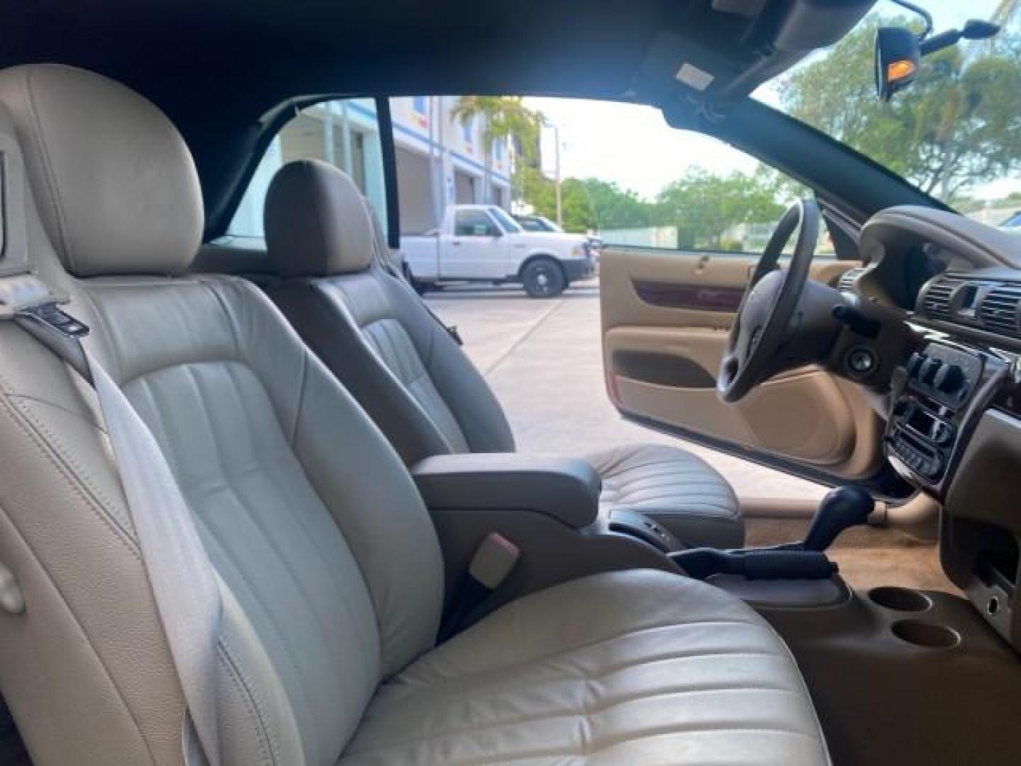 2002 Black /Sandstone Chrysler Sebring LXI 1 OWNER FL LOW MILES 22,632 (1C3EL55R32N) with an 2.7L MFI DOHC 24-Valve V6 Engine engine, Automatic transmission, located at 4701 North Dixie Hwy, Pompano Beach, FL, 33064, (954) 422-2889, 26.240938, -80.123474 - OUR WEBPAGE FLORIDACARS1.COM HAS OVER 100 PHOTOS AND FREE CARFAX LINK 2002 CHRYSLER SEBRING LXI VIN: 1C3EL55R32N294537 1 C 3 E L 5 5 R 3 2 N 2 9 4 5 3 7 CONVERTIBLE 2.7L V6 F DOHC GASOLINE FRONT WHEEL DRIVE Top Features Alloy Wheels Soft Top Cloth Seats Sunroof(s) Basic Features AM/FM Stereo CD Audi - Photo#12