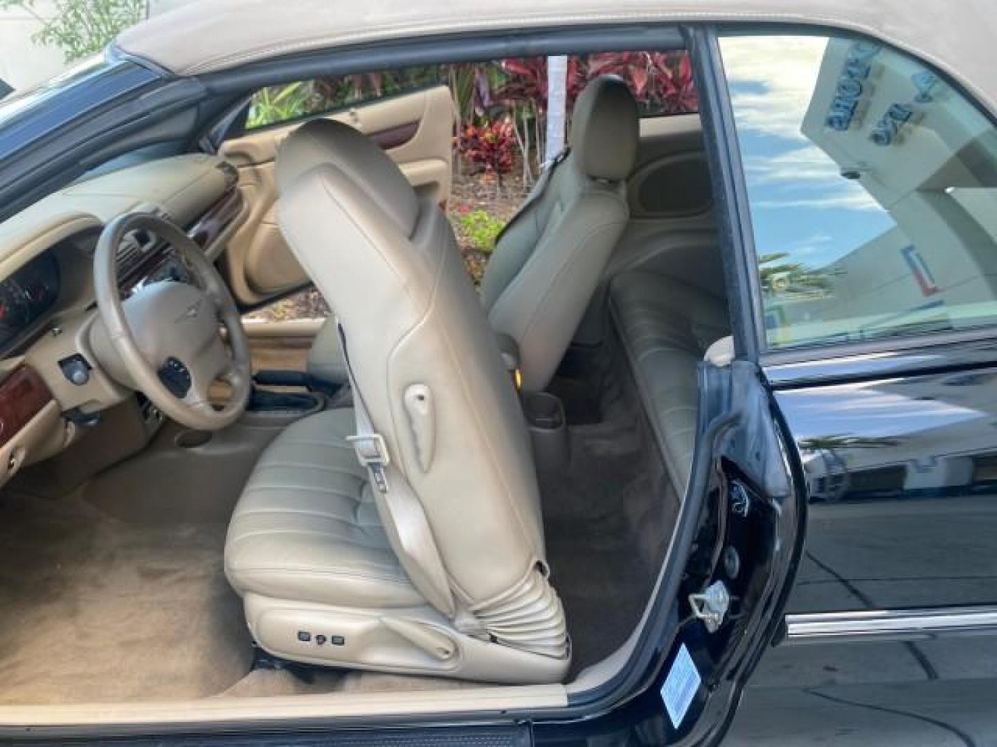 2002 Black /Sandstone Chrysler Sebring LXI 1 OWNER FL LOW MILES 22,632 (1C3EL55R32N) with an 2.7L MFI DOHC 24-Valve V6 Engine engine, Automatic transmission, located at 4701 North Dixie Hwy, Pompano Beach, FL, 33064, (954) 422-2889, 26.240938, -80.123474 - OUR WEBPAGE FLORIDACARS1.COM HAS OVER 100 PHOTOS AND FREE CARFAX LINK 2002 CHRYSLER SEBRING LXI VIN: 1C3EL55R32N294537 1 C 3 E L 5 5 R 3 2 N 2 9 4 5 3 7 CONVERTIBLE 2.7L V6 F DOHC GASOLINE FRONT WHEEL DRIVE Top Features Alloy Wheels Soft Top Cloth Seats Sunroof(s) Basic Features AM/FM Stereo CD Audi - Photo#13