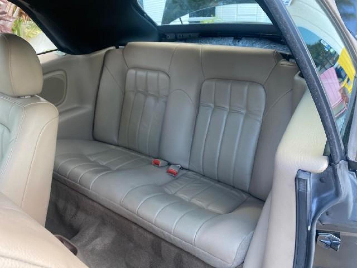 2002 Black /Sandstone Chrysler Sebring LXI 1 OWNER FL LOW MILES 22,632 (1C3EL55R32N) with an 2.7L MFI DOHC 24-Valve V6 Engine engine, Automatic transmission, located at 4701 North Dixie Hwy, Pompano Beach, FL, 33064, (954) 422-2889, 26.240938, -80.123474 - OUR WEBPAGE FLORIDACARS1.COM HAS OVER 100 PHOTOS AND FREE CARFAX LINK 2002 CHRYSLER SEBRING LXI VIN: 1C3EL55R32N294537 1 C 3 E L 5 5 R 3 2 N 2 9 4 5 3 7 CONVERTIBLE 2.7L V6 F DOHC GASOLINE FRONT WHEEL DRIVE Top Features Alloy Wheels Soft Top Cloth Seats Sunroof(s) Basic Features AM/FM Stereo CD Audi - Photo#14