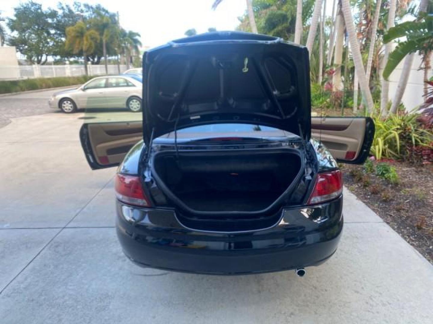 2002 Black /Sandstone Chrysler Sebring LXI 1 OWNER FL LOW MILES 22,632 (1C3EL55R32N) with an 2.7L MFI DOHC 24-Valve V6 Engine engine, Automatic transmission, located at 4701 North Dixie Hwy, Pompano Beach, FL, 33064, (954) 422-2889, 26.240938, -80.123474 - OUR WEBPAGE FLORIDACARS1.COM HAS OVER 100 PHOTOS AND FREE CARFAX LINK 2002 CHRYSLER SEBRING LXI VIN: 1C3EL55R32N294537 1 C 3 E L 5 5 R 3 2 N 2 9 4 5 3 7 CONVERTIBLE 2.7L V6 F DOHC GASOLINE FRONT WHEEL DRIVE Top Features Alloy Wheels Soft Top Cloth Seats Sunroof(s) Basic Features AM/FM Stereo CD Audi - Photo#15
