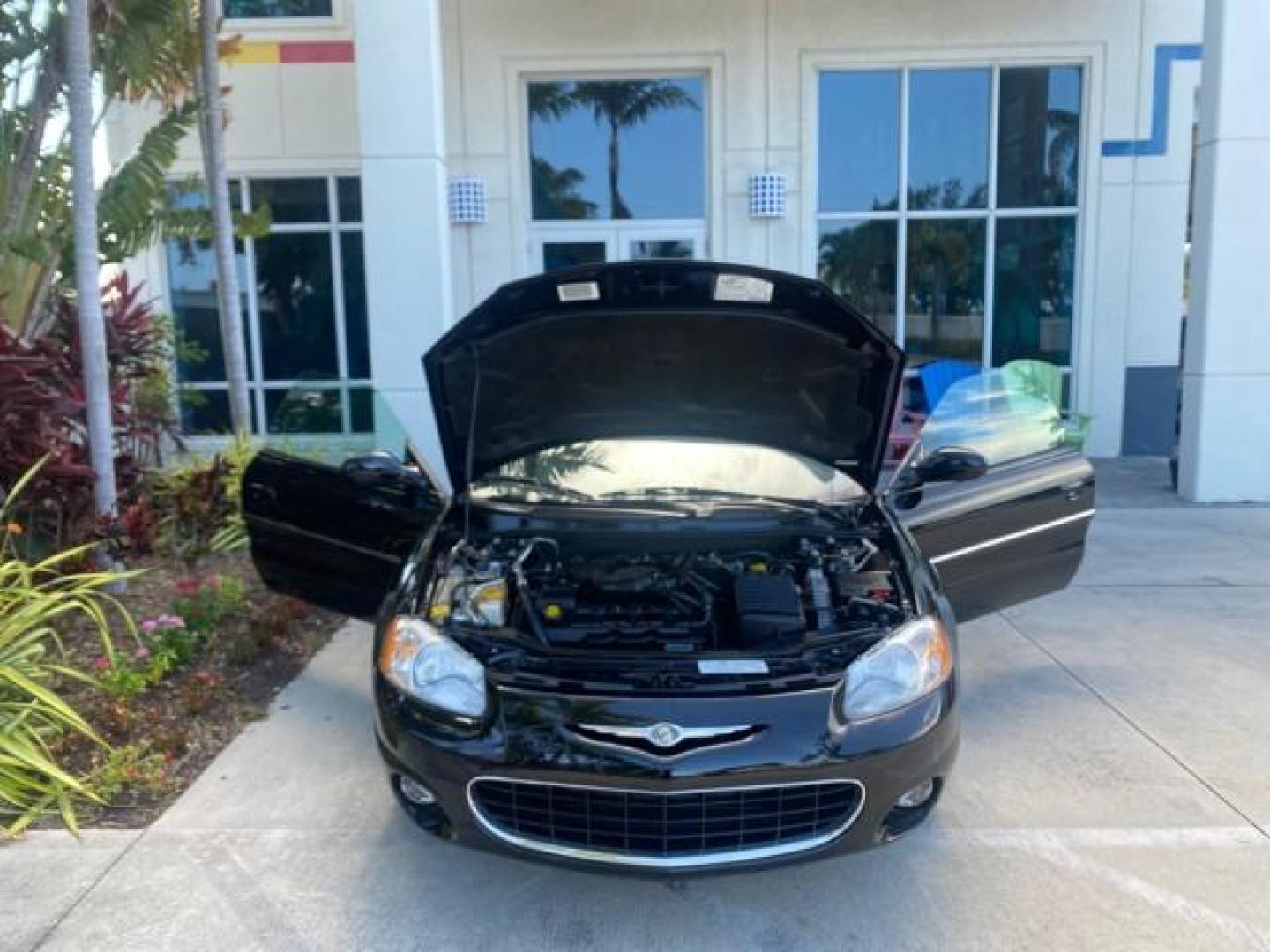 2002 Black /Sandstone Chrysler Sebring LXI 1 OWNER FL LOW MILES 22,632 (1C3EL55R32N) with an 2.7L MFI DOHC 24-Valve V6 Engine engine, Automatic transmission, located at 4701 North Dixie Hwy, Pompano Beach, FL, 33064, (954) 422-2889, 26.240938, -80.123474 - OUR WEBPAGE FLORIDACARS1.COM HAS OVER 100 PHOTOS AND FREE CARFAX LINK 2002 CHRYSLER SEBRING LXI VIN: 1C3EL55R32N294537 1 C 3 E L 5 5 R 3 2 N 2 9 4 5 3 7 CONVERTIBLE 2.7L V6 F DOHC GASOLINE FRONT WHEEL DRIVE Top Features Alloy Wheels Soft Top Cloth Seats Sunroof(s) Basic Features AM/FM Stereo CD Audi - Photo#16