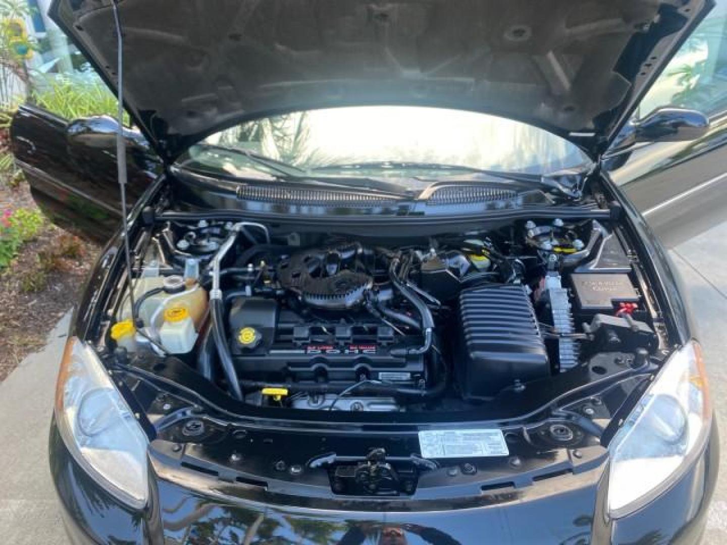 2002 Black /Sandstone Chrysler Sebring LXI 1 OWNER FL LOW MILES 22,632 (1C3EL55R32N) with an 2.7L MFI DOHC 24-Valve V6 Engine engine, Automatic transmission, located at 4701 North Dixie Hwy, Pompano Beach, FL, 33064, (954) 422-2889, 26.240938, -80.123474 - OUR WEBPAGE FLORIDACARS1.COM HAS OVER 100 PHOTOS AND FREE CARFAX LINK 2002 CHRYSLER SEBRING LXI VIN: 1C3EL55R32N294537 1 C 3 E L 5 5 R 3 2 N 2 9 4 5 3 7 CONVERTIBLE 2.7L V6 F DOHC GASOLINE FRONT WHEEL DRIVE Top Features Alloy Wheels Soft Top Cloth Seats Sunroof(s) Basic Features AM/FM Stereo CD Audi - Photo#17