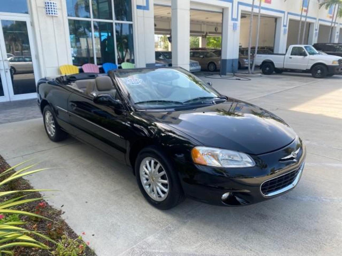 2002 Black /Sandstone Chrysler Sebring LXI 1 OWNER FL LOW MILES 22,632 (1C3EL55R32N) with an 2.7L MFI DOHC 24-Valve V6 Engine engine, Automatic transmission, located at 4701 North Dixie Hwy, Pompano Beach, FL, 33064, (954) 422-2889, 26.240938, -80.123474 - OUR WEBPAGE FLORIDACARS1.COM HAS OVER 100 PHOTOS AND FREE CARFAX LINK 2002 CHRYSLER SEBRING LXI VIN: 1C3EL55R32N294537 1 C 3 E L 5 5 R 3 2 N 2 9 4 5 3 7 CONVERTIBLE 2.7L V6 F DOHC GASOLINE FRONT WHEEL DRIVE Top Features Alloy Wheels Soft Top Cloth Seats Sunroof(s) Basic Features AM/FM Stereo CD Audi - Photo#25