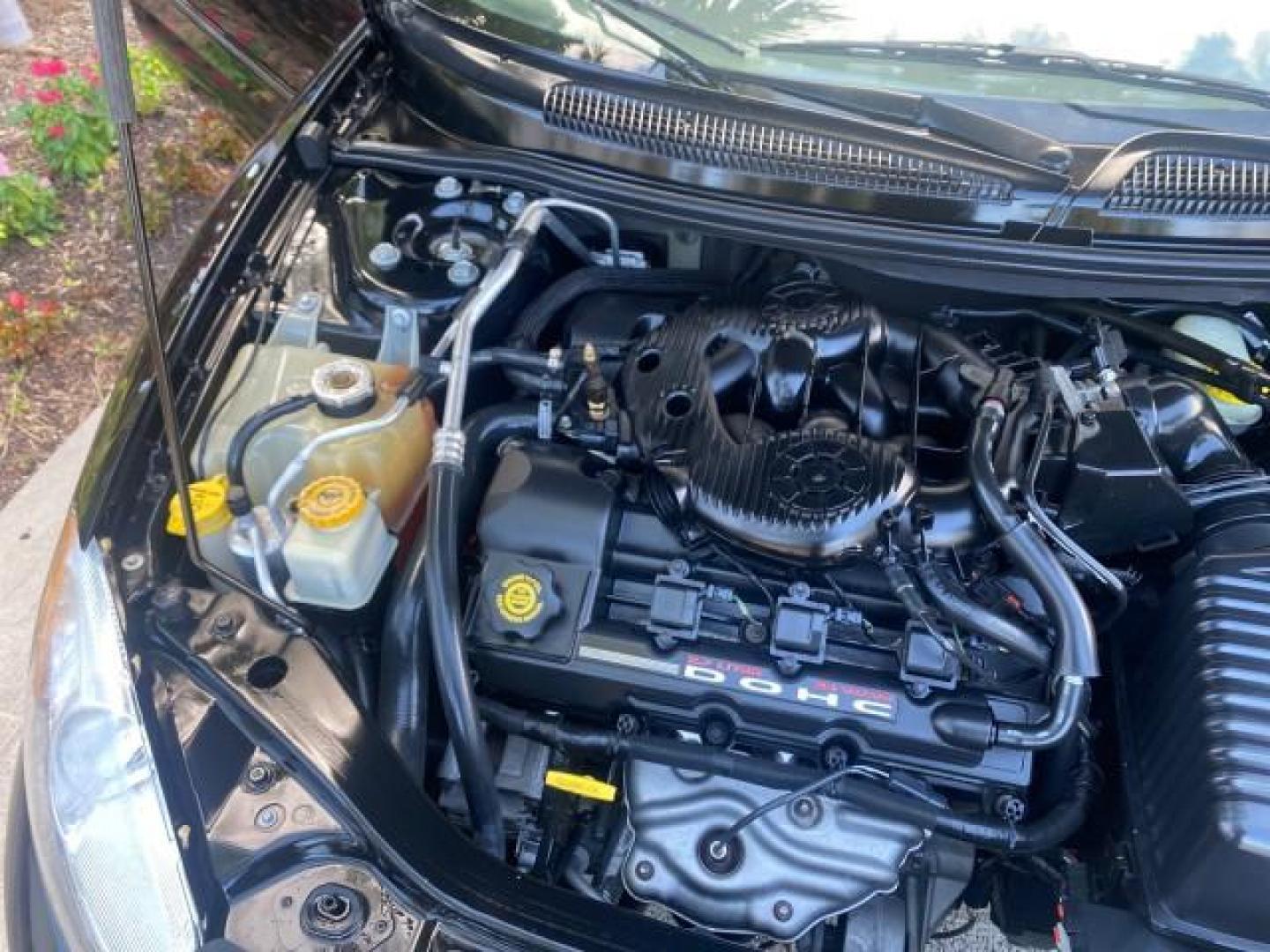 2002 Black /Sandstone Chrysler Sebring LXI 1 OWNER FL LOW MILES 22,632 (1C3EL55R32N) with an 2.7L MFI DOHC 24-Valve V6 Engine engine, Automatic transmission, located at 4701 North Dixie Hwy, Pompano Beach, FL, 33064, (954) 422-2889, 26.240938, -80.123474 - OUR WEBPAGE FLORIDACARS1.COM HAS OVER 100 PHOTOS AND FREE CARFAX LINK 2002 CHRYSLER SEBRING LXI VIN: 1C3EL55R32N294537 1 C 3 E L 5 5 R 3 2 N 2 9 4 5 3 7 CONVERTIBLE 2.7L V6 F DOHC GASOLINE FRONT WHEEL DRIVE Top Features Alloy Wheels Soft Top Cloth Seats Sunroof(s) Basic Features AM/FM Stereo CD Audi - Photo#26