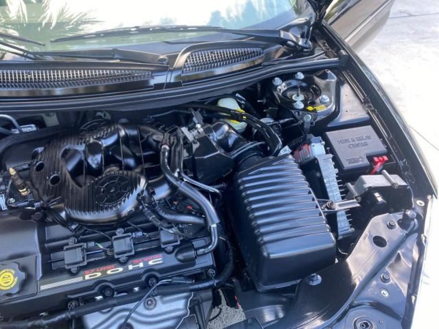 2002 Black /Sandstone Chrysler Sebring LXI 1 OWNER FL LOW MILES 22,632 (1C3EL55R32N) with an 2.7L MFI DOHC 24-Valve V6 Engine engine, Automatic transmission, located at 4701 North Dixie Hwy, Pompano Beach, FL, 33064, (954) 422-2889, 26.240938, -80.123474 - OUR WEBPAGE FLORIDACARS1.COM HAS OVER 100 PHOTOS AND FREE CARFAX LINK 2002 CHRYSLER SEBRING LXI VIN: 1C3EL55R32N294537 1 C 3 E L 5 5 R 3 2 N 2 9 4 5 3 7 CONVERTIBLE 2.7L V6 F DOHC GASOLINE FRONT WHEEL DRIVE Top Features Alloy Wheels Soft Top Cloth Seats Sunroof(s) Basic Features AM/FM Stereo CD Audi - Photo#27