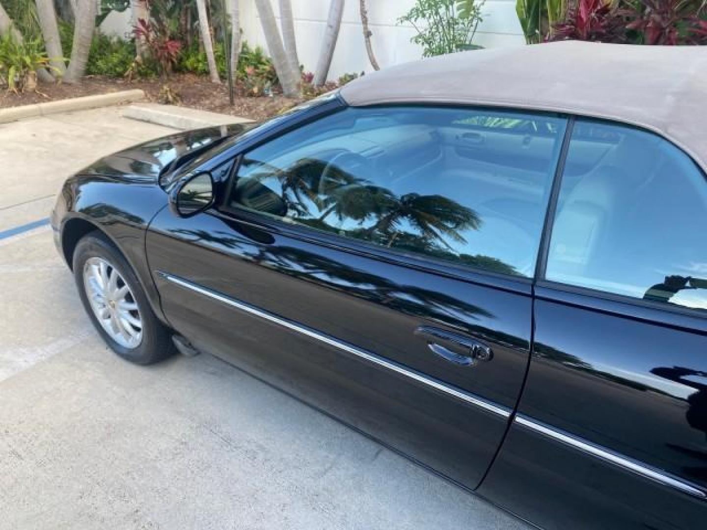 2002 Black /Sandstone Chrysler Sebring LXI 1 OWNER FL LOW MILES 22,632 (1C3EL55R32N) with an 2.7L MFI DOHC 24-Valve V6 Engine engine, Automatic transmission, located at 4701 North Dixie Hwy, Pompano Beach, FL, 33064, (954) 422-2889, 26.240938, -80.123474 - OUR WEBPAGE FLORIDACARS1.COM HAS OVER 100 PHOTOS AND FREE CARFAX LINK 2002 CHRYSLER SEBRING LXI VIN: 1C3EL55R32N294537 1 C 3 E L 5 5 R 3 2 N 2 9 4 5 3 7 CONVERTIBLE 2.7L V6 F DOHC GASOLINE FRONT WHEEL DRIVE Top Features Alloy Wheels Soft Top Cloth Seats Sunroof(s) Basic Features AM/FM Stereo CD Audi - Photo#28