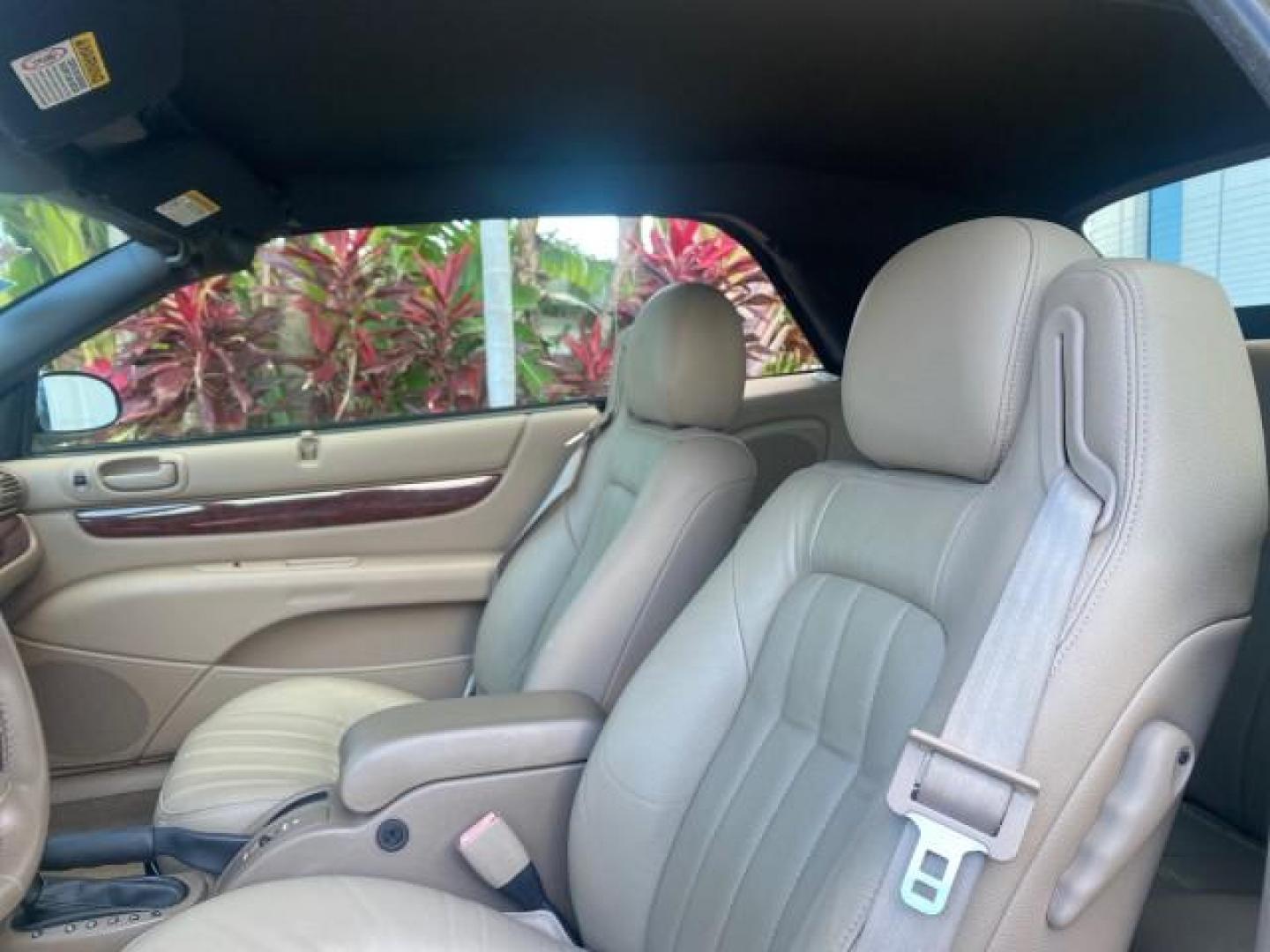 2002 Black /Sandstone Chrysler Sebring LXI 1 OWNER FL LOW MILES 22,632 (1C3EL55R32N) with an 2.7L MFI DOHC 24-Valve V6 Engine engine, Automatic transmission, located at 4701 North Dixie Hwy, Pompano Beach, FL, 33064, (954) 422-2889, 26.240938, -80.123474 - OUR WEBPAGE FLORIDACARS1.COM HAS OVER 100 PHOTOS AND FREE CARFAX LINK 2002 CHRYSLER SEBRING LXI VIN: 1C3EL55R32N294537 1 C 3 E L 5 5 R 3 2 N 2 9 4 5 3 7 CONVERTIBLE 2.7L V6 F DOHC GASOLINE FRONT WHEEL DRIVE Top Features Alloy Wheels Soft Top Cloth Seats Sunroof(s) Basic Features AM/FM Stereo CD Audi - Photo#33