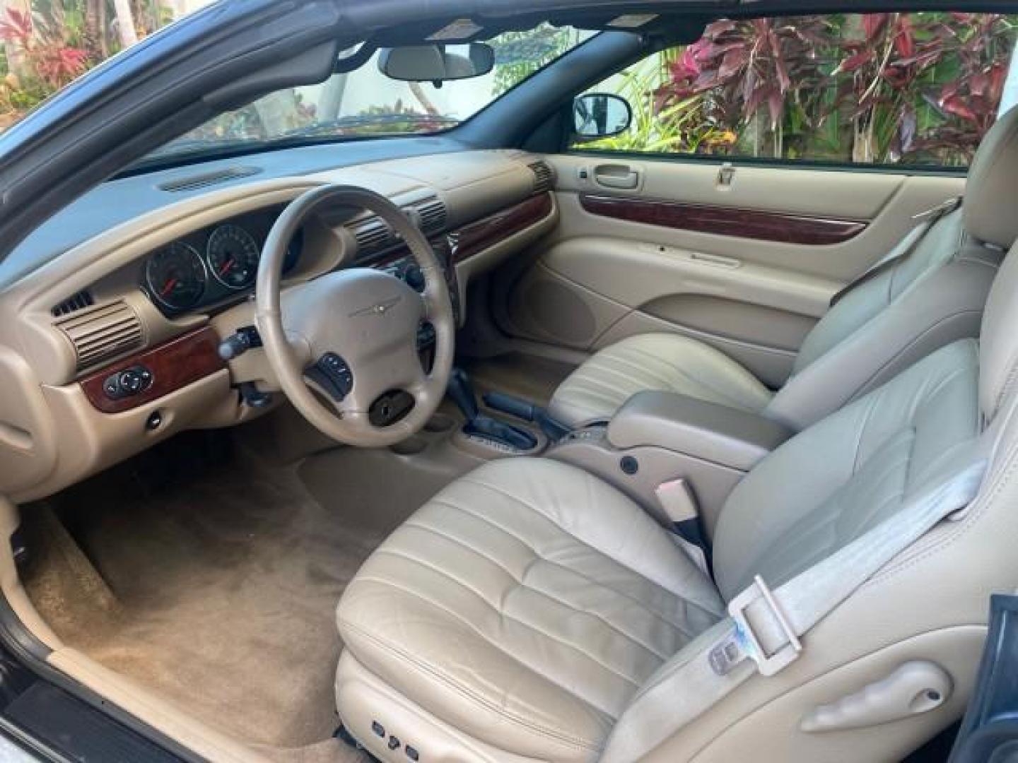 2002 Black /Sandstone Chrysler Sebring LXI 1 OWNER FL LOW MILES 22,632 (1C3EL55R32N) with an 2.7L MFI DOHC 24-Valve V6 Engine engine, Automatic transmission, located at 4701 North Dixie Hwy, Pompano Beach, FL, 33064, (954) 422-2889, 26.240938, -80.123474 - OUR WEBPAGE FLORIDACARS1.COM HAS OVER 100 PHOTOS AND FREE CARFAX LINK 2002 CHRYSLER SEBRING LXI VIN: 1C3EL55R32N294537 1 C 3 E L 5 5 R 3 2 N 2 9 4 5 3 7 CONVERTIBLE 2.7L V6 F DOHC GASOLINE FRONT WHEEL DRIVE Top Features Alloy Wheels Soft Top Cloth Seats Sunroof(s) Basic Features AM/FM Stereo CD Audi - Photo#36