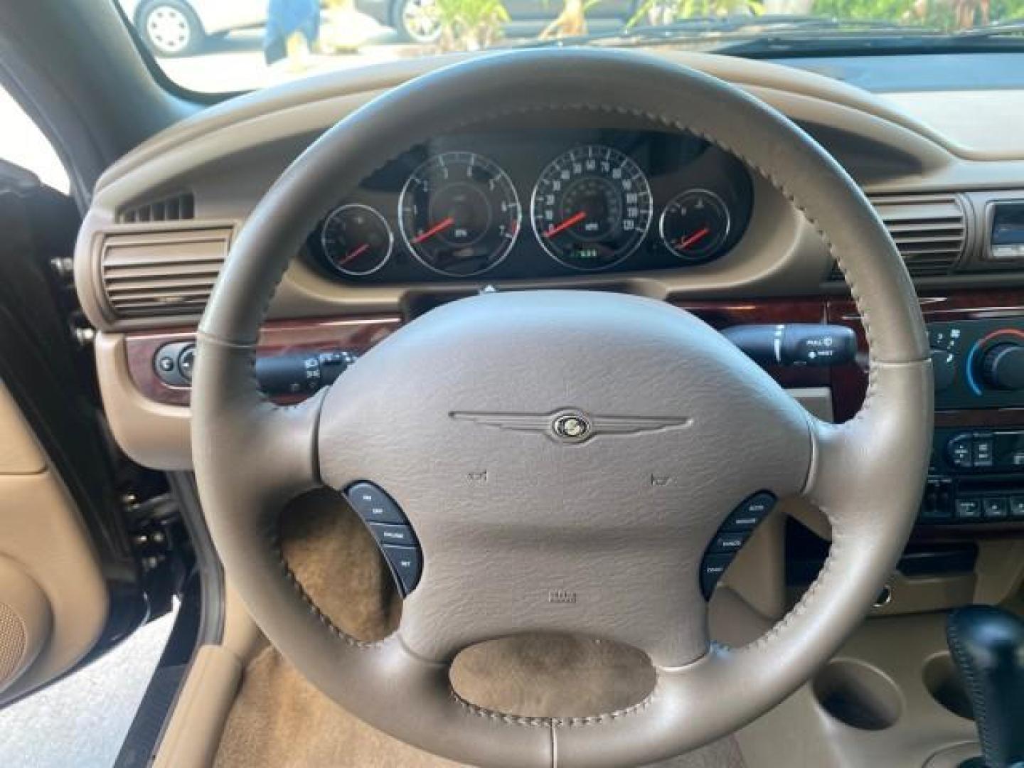 2002 Black /Sandstone Chrysler Sebring LXI 1 OWNER FL LOW MILES 22,632 (1C3EL55R32N) with an 2.7L MFI DOHC 24-Valve V6 Engine engine, Automatic transmission, located at 4701 North Dixie Hwy, Pompano Beach, FL, 33064, (954) 422-2889, 26.240938, -80.123474 - OUR WEBPAGE FLORIDACARS1.COM HAS OVER 100 PHOTOS AND FREE CARFAX LINK 2002 CHRYSLER SEBRING LXI VIN: 1C3EL55R32N294537 1 C 3 E L 5 5 R 3 2 N 2 9 4 5 3 7 CONVERTIBLE 2.7L V6 F DOHC GASOLINE FRONT WHEEL DRIVE Top Features Alloy Wheels Soft Top Cloth Seats Sunroof(s) Basic Features AM/FM Stereo CD Audi - Photo#38