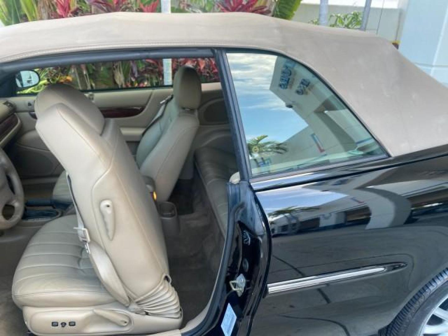 2002 Black /Sandstone Chrysler Sebring LXI 1 OWNER FL LOW MILES 22,632 (1C3EL55R32N) with an 2.7L MFI DOHC 24-Valve V6 Engine engine, Automatic transmission, located at 4701 North Dixie Hwy, Pompano Beach, FL, 33064, (954) 422-2889, 26.240938, -80.123474 - OUR WEBPAGE FLORIDACARS1.COM HAS OVER 100 PHOTOS AND FREE CARFAX LINK 2002 CHRYSLER SEBRING LXI VIN: 1C3EL55R32N294537 1 C 3 E L 5 5 R 3 2 N 2 9 4 5 3 7 CONVERTIBLE 2.7L V6 F DOHC GASOLINE FRONT WHEEL DRIVE Top Features Alloy Wheels Soft Top Cloth Seats Sunroof(s) Basic Features AM/FM Stereo CD Audi - Photo#57