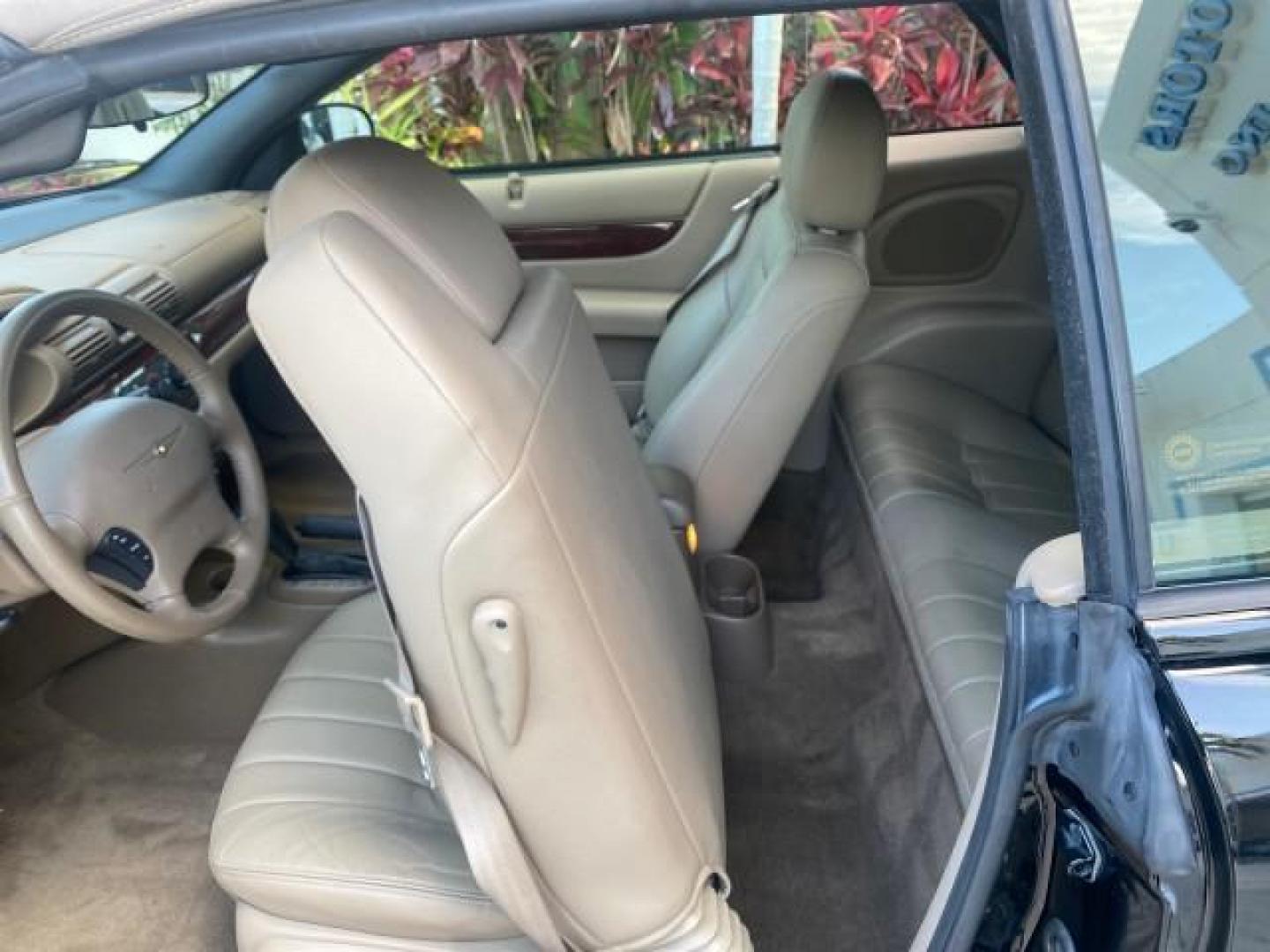 2002 Black /Sandstone Chrysler Sebring LXI 1 OWNER FL LOW MILES 22,632 (1C3EL55R32N) with an 2.7L MFI DOHC 24-Valve V6 Engine engine, Automatic transmission, located at 4701 North Dixie Hwy, Pompano Beach, FL, 33064, (954) 422-2889, 26.240938, -80.123474 - OUR WEBPAGE FLORIDACARS1.COM HAS OVER 100 PHOTOS AND FREE CARFAX LINK 2002 CHRYSLER SEBRING LXI VIN: 1C3EL55R32N294537 1 C 3 E L 5 5 R 3 2 N 2 9 4 5 3 7 CONVERTIBLE 2.7L V6 F DOHC GASOLINE FRONT WHEEL DRIVE Top Features Alloy Wheels Soft Top Cloth Seats Sunroof(s) Basic Features AM/FM Stereo CD Audi - Photo#58