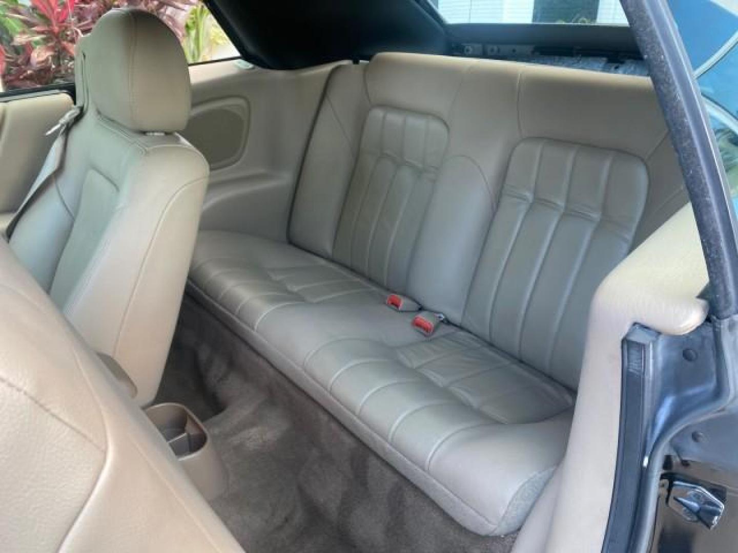 2002 Black /Sandstone Chrysler Sebring LXI 1 OWNER FL LOW MILES 22,632 (1C3EL55R32N) with an 2.7L MFI DOHC 24-Valve V6 Engine engine, Automatic transmission, located at 4701 North Dixie Hwy, Pompano Beach, FL, 33064, (954) 422-2889, 26.240938, -80.123474 - OUR WEBPAGE FLORIDACARS1.COM HAS OVER 100 PHOTOS AND FREE CARFAX LINK 2002 CHRYSLER SEBRING LXI VIN: 1C3EL55R32N294537 1 C 3 E L 5 5 R 3 2 N 2 9 4 5 3 7 CONVERTIBLE 2.7L V6 F DOHC GASOLINE FRONT WHEEL DRIVE Top Features Alloy Wheels Soft Top Cloth Seats Sunroof(s) Basic Features AM/FM Stereo CD Audi - Photo#59