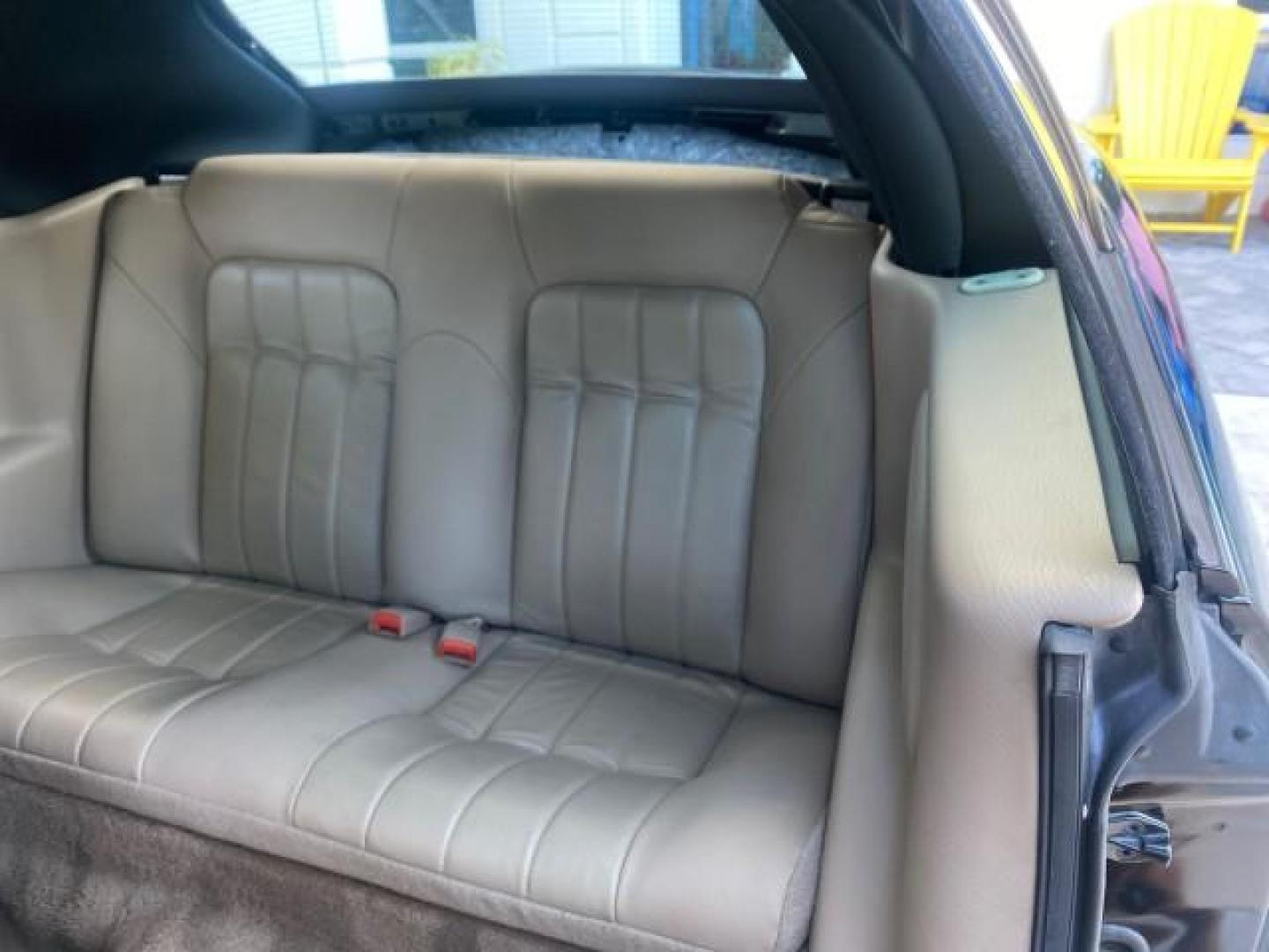 2002 Black /Sandstone Chrysler Sebring LXI 1 OWNER FL LOW MILES 22,632 (1C3EL55R32N) with an 2.7L MFI DOHC 24-Valve V6 Engine engine, Automatic transmission, located at 4701 North Dixie Hwy, Pompano Beach, FL, 33064, (954) 422-2889, 26.240938, -80.123474 - OUR WEBPAGE FLORIDACARS1.COM HAS OVER 100 PHOTOS AND FREE CARFAX LINK 2002 CHRYSLER SEBRING LXI VIN: 1C3EL55R32N294537 1 C 3 E L 5 5 R 3 2 N 2 9 4 5 3 7 CONVERTIBLE 2.7L V6 F DOHC GASOLINE FRONT WHEEL DRIVE Top Features Alloy Wheels Soft Top Cloth Seats Sunroof(s) Basic Features AM/FM Stereo CD Audi - Photo#60