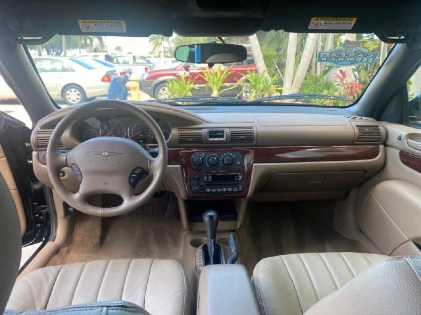 2002 Black /Sandstone Chrysler Sebring LXI 1 OWNER FL LOW MILES 22,632 (1C3EL55R32N) with an 2.7L MFI DOHC 24-Valve V6 Engine engine, Automatic transmission, located at 4701 North Dixie Hwy, Pompano Beach, FL, 33064, (954) 422-2889, 26.240938, -80.123474 - OUR WEBPAGE FLORIDACARS1.COM HAS OVER 100 PHOTOS AND FREE CARFAX LINK 2002 CHRYSLER SEBRING LXI VIN: 1C3EL55R32N294537 1 C 3 E L 5 5 R 3 2 N 2 9 4 5 3 7 CONVERTIBLE 2.7L V6 F DOHC GASOLINE FRONT WHEEL DRIVE Top Features Alloy Wheels Soft Top Cloth Seats Sunroof(s) Basic Features AM/FM Stereo CD Audi - Photo#61
