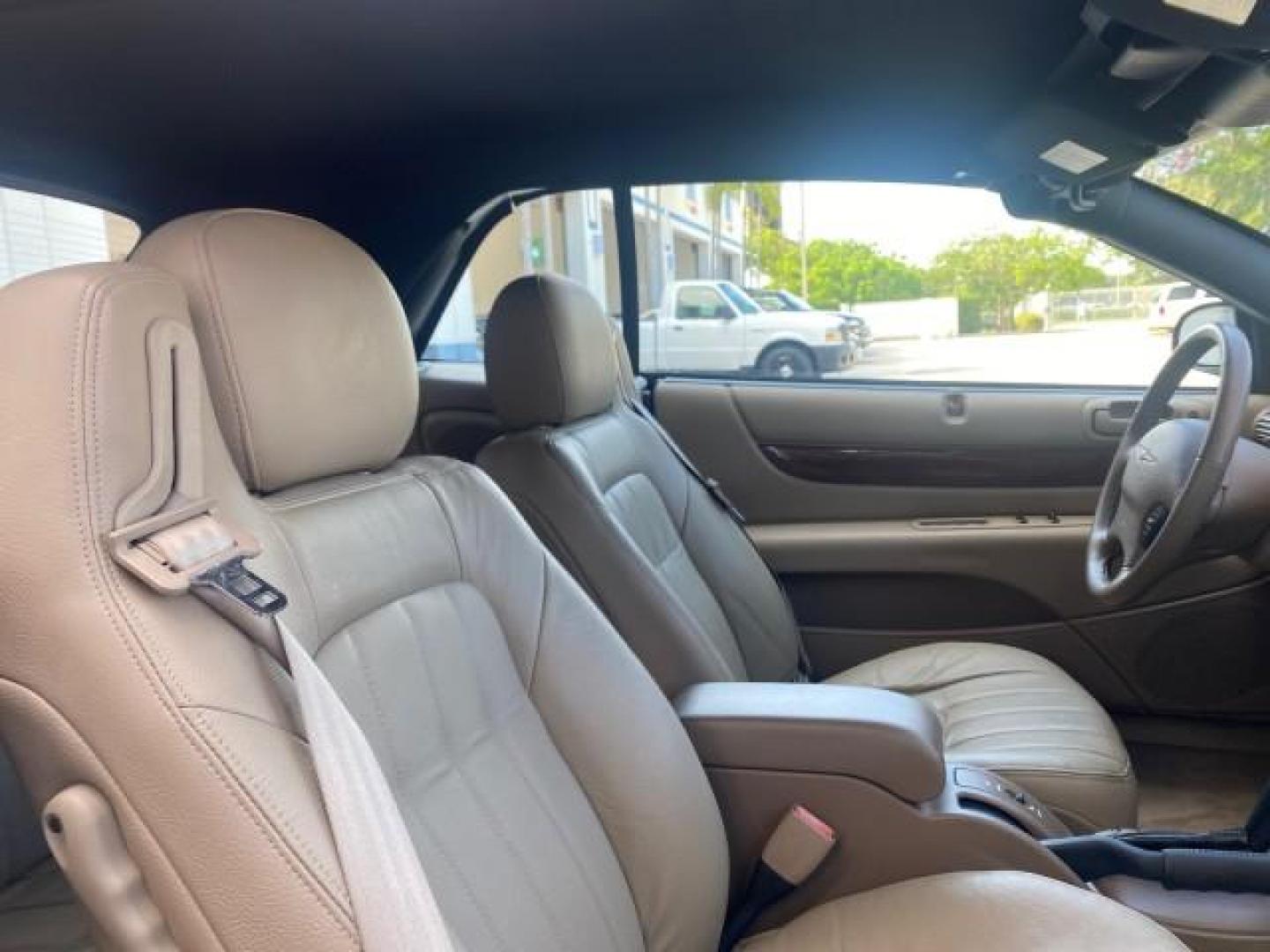 2002 Black /Sandstone Chrysler Sebring LXI 1 OWNER FL LOW MILES 22,632 (1C3EL55R32N) with an 2.7L MFI DOHC 24-Valve V6 Engine engine, Automatic transmission, located at 4701 North Dixie Hwy, Pompano Beach, FL, 33064, (954) 422-2889, 26.240938, -80.123474 - OUR WEBPAGE FLORIDACARS1.COM HAS OVER 100 PHOTOS AND FREE CARFAX LINK 2002 CHRYSLER SEBRING LXI VIN: 1C3EL55R32N294537 1 C 3 E L 5 5 R 3 2 N 2 9 4 5 3 7 CONVERTIBLE 2.7L V6 F DOHC GASOLINE FRONT WHEEL DRIVE Top Features Alloy Wheels Soft Top Cloth Seats Sunroof(s) Basic Features AM/FM Stereo CD Audi - Photo#81