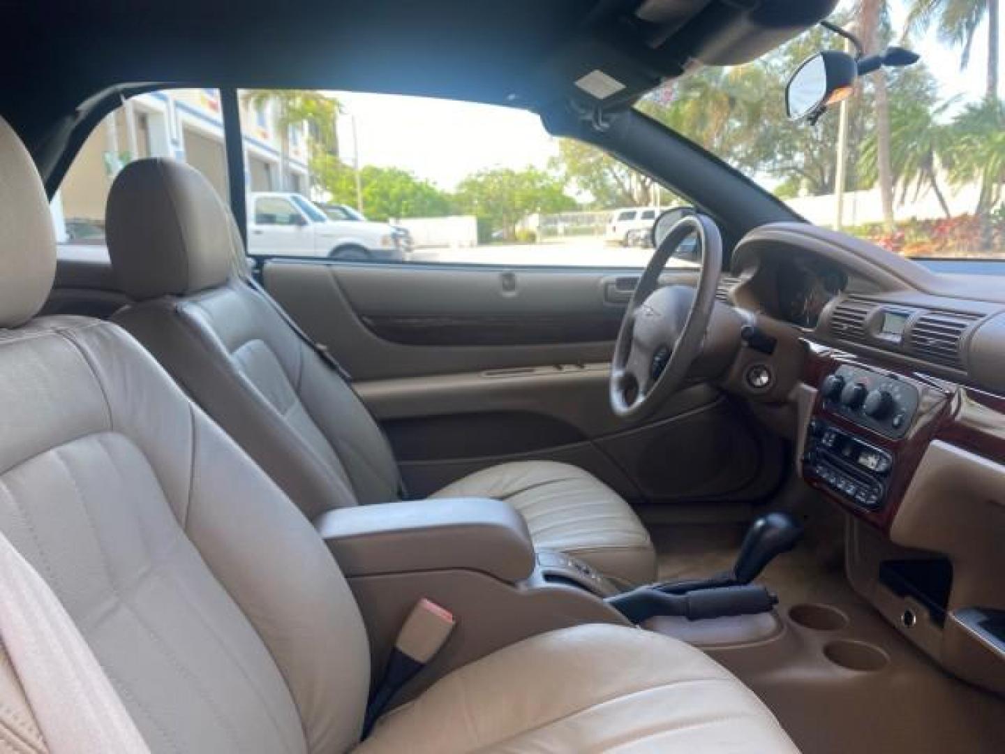 2002 Black /Sandstone Chrysler Sebring LXI 1 OWNER FL LOW MILES 22,632 (1C3EL55R32N) with an 2.7L MFI DOHC 24-Valve V6 Engine engine, Automatic transmission, located at 4701 North Dixie Hwy, Pompano Beach, FL, 33064, (954) 422-2889, 26.240938, -80.123474 - OUR WEBPAGE FLORIDACARS1.COM HAS OVER 100 PHOTOS AND FREE CARFAX LINK 2002 CHRYSLER SEBRING LXI VIN: 1C3EL55R32N294537 1 C 3 E L 5 5 R 3 2 N 2 9 4 5 3 7 CONVERTIBLE 2.7L V6 F DOHC GASOLINE FRONT WHEEL DRIVE Top Features Alloy Wheels Soft Top Cloth Seats Sunroof(s) Basic Features AM/FM Stereo CD Audi - Photo#82