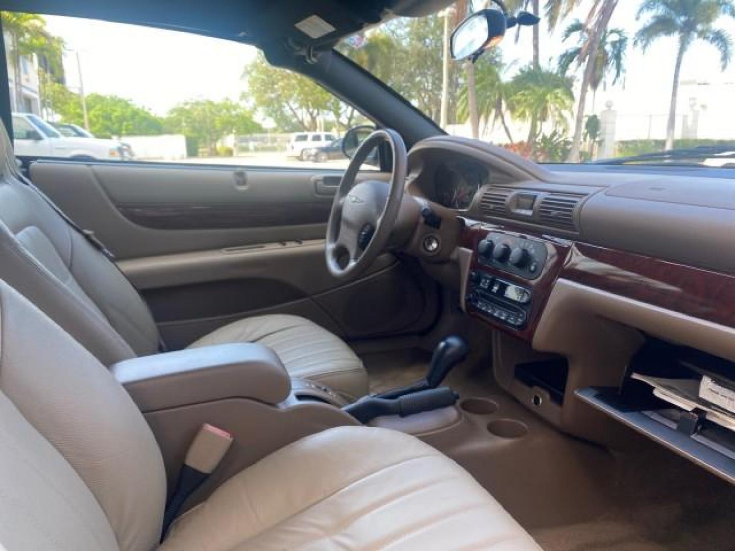 2002 Black /Sandstone Chrysler Sebring LXI 1 OWNER FL LOW MILES 22,632 (1C3EL55R32N) with an 2.7L MFI DOHC 24-Valve V6 Engine engine, Automatic transmission, located at 4701 North Dixie Hwy, Pompano Beach, FL, 33064, (954) 422-2889, 26.240938, -80.123474 - OUR WEBPAGE FLORIDACARS1.COM HAS OVER 100 PHOTOS AND FREE CARFAX LINK 2002 CHRYSLER SEBRING LXI VIN: 1C3EL55R32N294537 1 C 3 E L 5 5 R 3 2 N 2 9 4 5 3 7 CONVERTIBLE 2.7L V6 F DOHC GASOLINE FRONT WHEEL DRIVE Top Features Alloy Wheels Soft Top Cloth Seats Sunroof(s) Basic Features AM/FM Stereo CD Audi - Photo#83