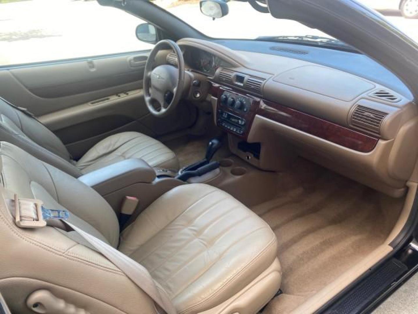 2002 Black /Sandstone Chrysler Sebring LXI 1 OWNER FL LOW MILES 22,632 (1C3EL55R32N) with an 2.7L MFI DOHC 24-Valve V6 Engine engine, Automatic transmission, located at 4701 North Dixie Hwy, Pompano Beach, FL, 33064, (954) 422-2889, 26.240938, -80.123474 - OUR WEBPAGE FLORIDACARS1.COM HAS OVER 100 PHOTOS AND FREE CARFAX LINK 2002 CHRYSLER SEBRING LXI VIN: 1C3EL55R32N294537 1 C 3 E L 5 5 R 3 2 N 2 9 4 5 3 7 CONVERTIBLE 2.7L V6 F DOHC GASOLINE FRONT WHEEL DRIVE Top Features Alloy Wheels Soft Top Cloth Seats Sunroof(s) Basic Features AM/FM Stereo CD Audi - Photo#85