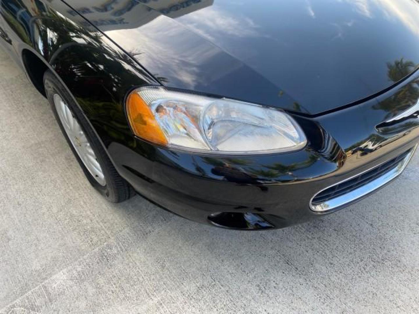 2002 Black /Sandstone Chrysler Sebring LXI 1 OWNER FL LOW MILES 22,632 (1C3EL55R32N) with an 2.7L MFI DOHC 24-Valve V6 Engine engine, Automatic transmission, located at 4701 North Dixie Hwy, Pompano Beach, FL, 33064, (954) 422-2889, 26.240938, -80.123474 - OUR WEBPAGE FLORIDACARS1.COM HAS OVER 100 PHOTOS AND FREE CARFAX LINK 2002 CHRYSLER SEBRING LXI VIN: 1C3EL55R32N294537 1 C 3 E L 5 5 R 3 2 N 2 9 4 5 3 7 CONVERTIBLE 2.7L V6 F DOHC GASOLINE FRONT WHEEL DRIVE Top Features Alloy Wheels Soft Top Cloth Seats Sunroof(s) Basic Features AM/FM Stereo CD Audi - Photo#94