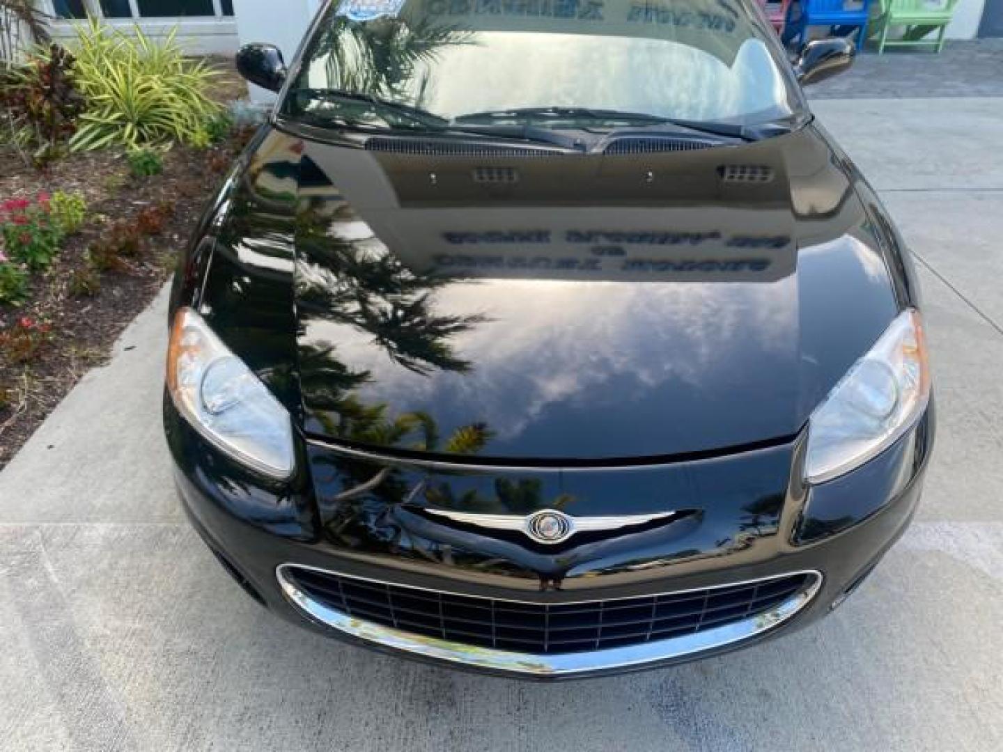 2002 Black /Sandstone Chrysler Sebring LXI 1 OWNER FL LOW MILES 22,632 (1C3EL55R32N) with an 2.7L MFI DOHC 24-Valve V6 Engine engine, Automatic transmission, located at 4701 North Dixie Hwy, Pompano Beach, FL, 33064, (954) 422-2889, 26.240938, -80.123474 - OUR WEBPAGE FLORIDACARS1.COM HAS OVER 100 PHOTOS AND FREE CARFAX LINK 2002 CHRYSLER SEBRING LXI VIN: 1C3EL55R32N294537 1 C 3 E L 5 5 R 3 2 N 2 9 4 5 3 7 CONVERTIBLE 2.7L V6 F DOHC GASOLINE FRONT WHEEL DRIVE Top Features Alloy Wheels Soft Top Cloth Seats Sunroof(s) Basic Features AM/FM Stereo CD Audi - Photo#95