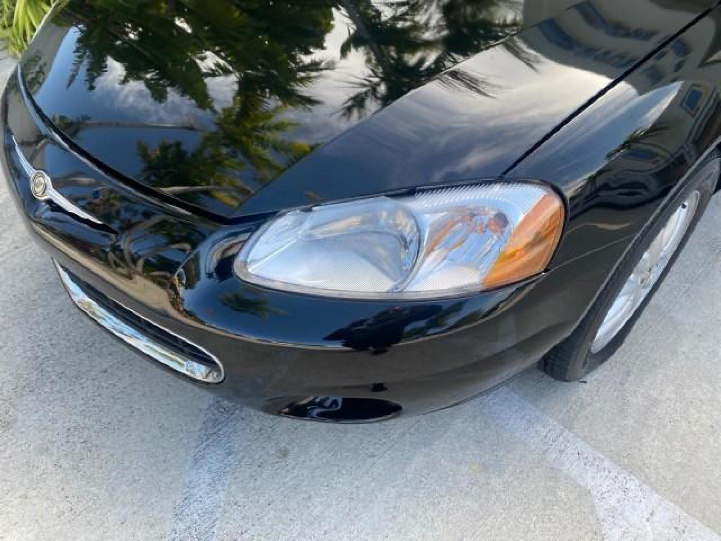 2002 Black /Sandstone Chrysler Sebring LXI 1 OWNER FL LOW MILES 22,632 (1C3EL55R32N) with an 2.7L MFI DOHC 24-Valve V6 Engine engine, Automatic transmission, located at 4701 North Dixie Hwy, Pompano Beach, FL, 33064, (954) 422-2889, 26.240938, -80.123474 - OUR WEBPAGE FLORIDACARS1.COM HAS OVER 100 PHOTOS AND FREE CARFAX LINK 2002 CHRYSLER SEBRING LXI VIN: 1C3EL55R32N294537 1 C 3 E L 5 5 R 3 2 N 2 9 4 5 3 7 CONVERTIBLE 2.7L V6 F DOHC GASOLINE FRONT WHEEL DRIVE Top Features Alloy Wheels Soft Top Cloth Seats Sunroof(s) Basic Features AM/FM Stereo CD Audi - Photo#98