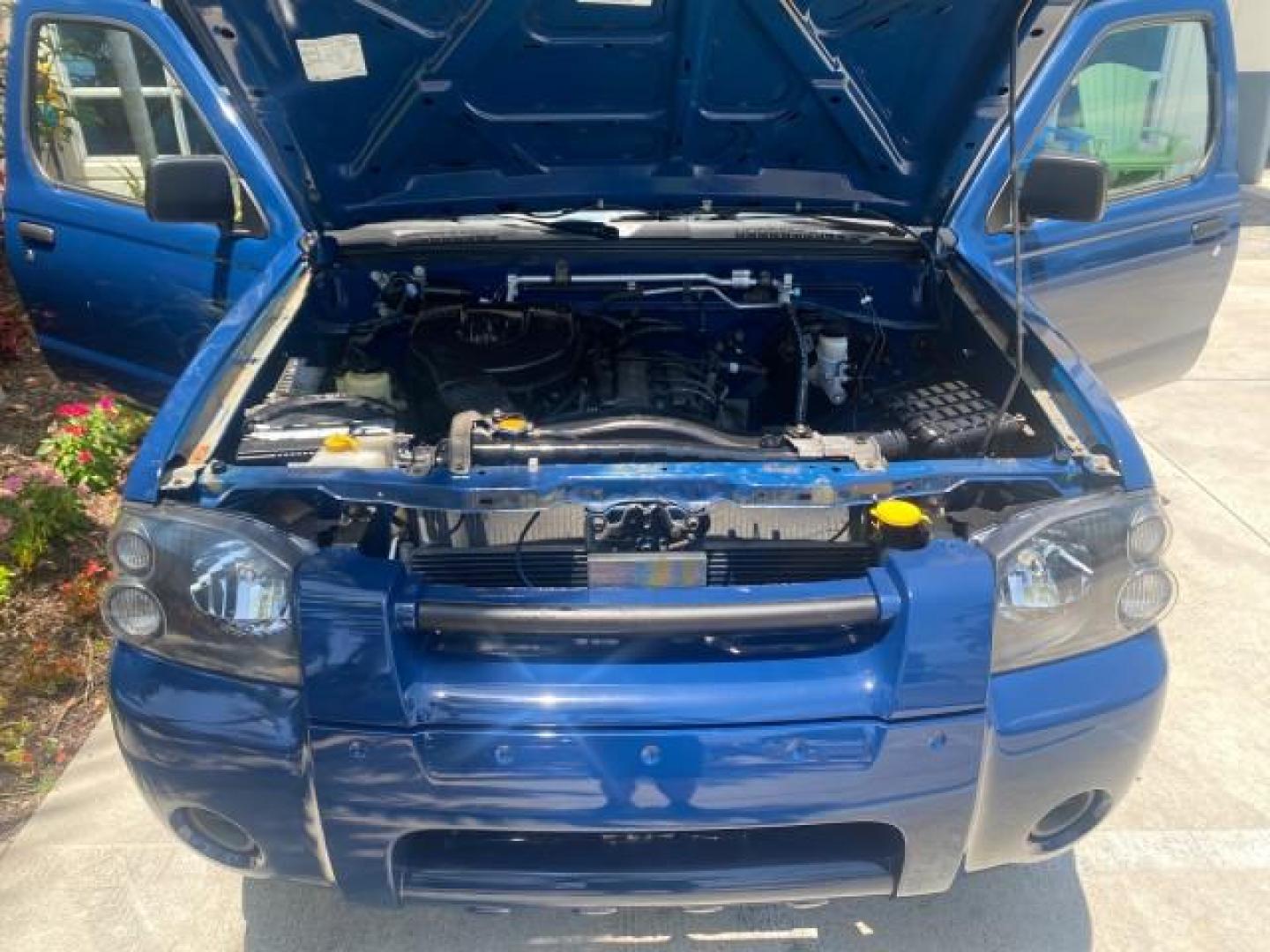 2002 Electric Blue Metallic /Gray Nissan Frontier 2WD XE FL LOW MILES 73,028 (1N6DD26S92C) with an 2.4L DOHC SMPI 16-Valve 4-Cyl Engine engine, Automatic transmission, located at 4701 North Dixie Hwy, Pompano Beach, FL, 33064, (954) 422-2889, 26.240938, -80.123474 - OUR WEBPAGE FLORIDACARS1.COM HAS OVER 100 PHOTOS AND FREE CARFAX LINK 2002 NISSAN FRONTIER XE VIN: 1N6DD26S92C366273 1 N 6 D D 2 6 S 9 2 C 3 6 6 2 7 3 CLUB CAB PICKUP 2.4L I4 F DOHC 16V GASOLINE REAR WHEEL DRIVE Top Features Alloy Wheels Cloth Seats Bed Liner Basic Features ABS Brakes Air Conditioni - Photo#17